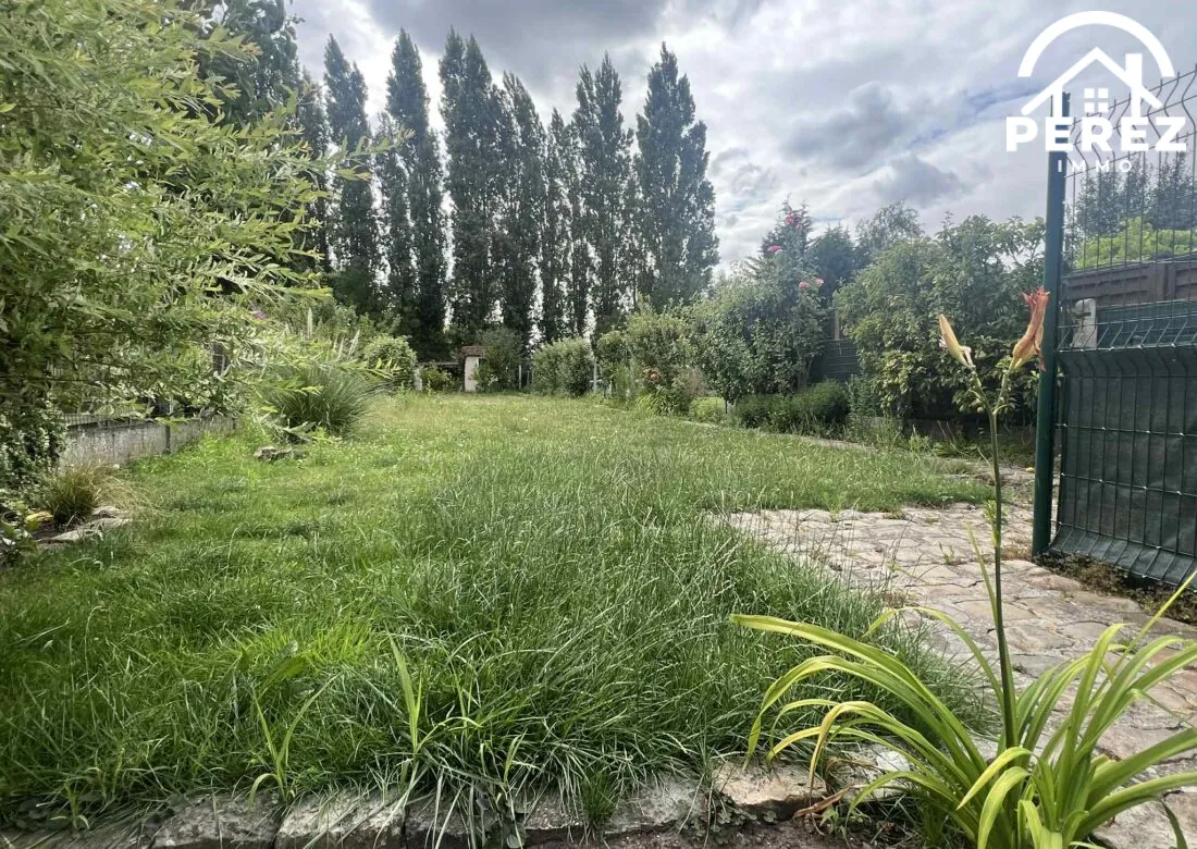 Maison à vendre à Roncq de 112m² avec jardin et garage, idéal famille 