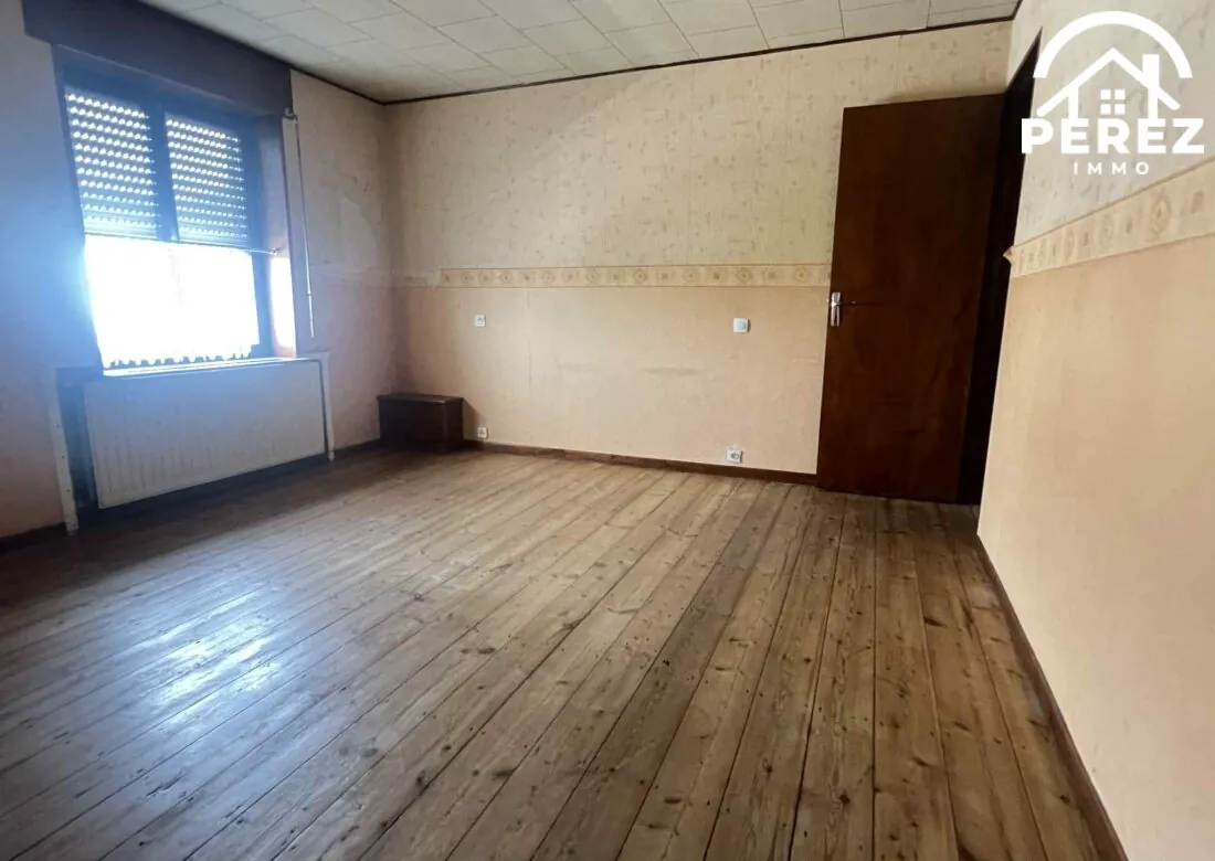 Maison à vendre à Roncq de 112m² avec jardin et garage, idéal famille 