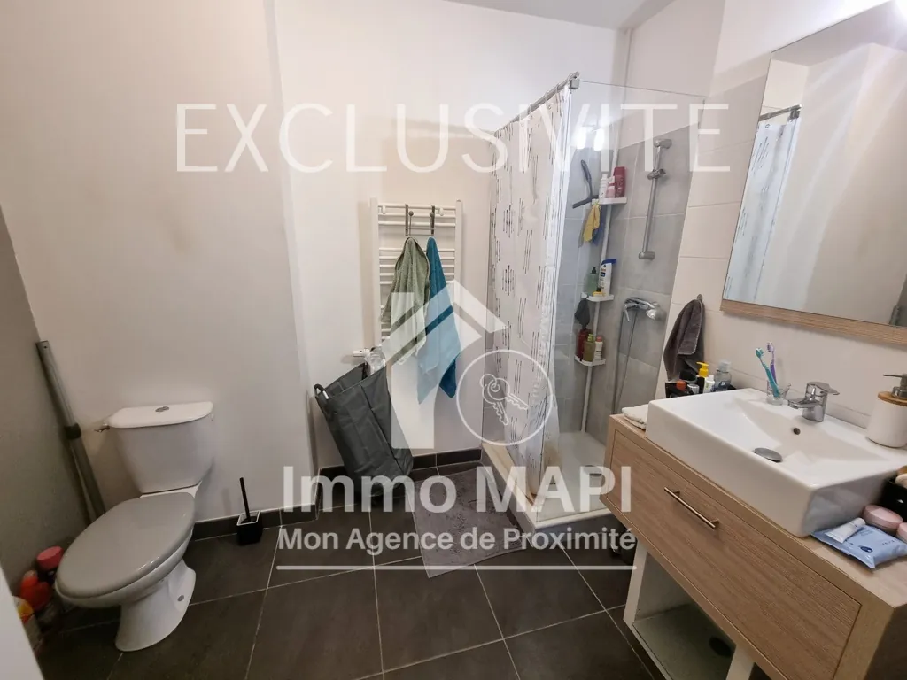 Appartement T2 à Juvignac avec terrasse, parking sécurisé et proximité tramway 