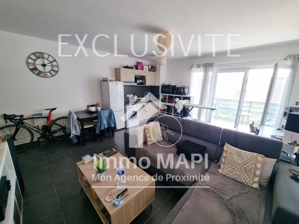 Appartement T2 à Juvignac avec terrasse, parking sécurisé et proximité tramway 