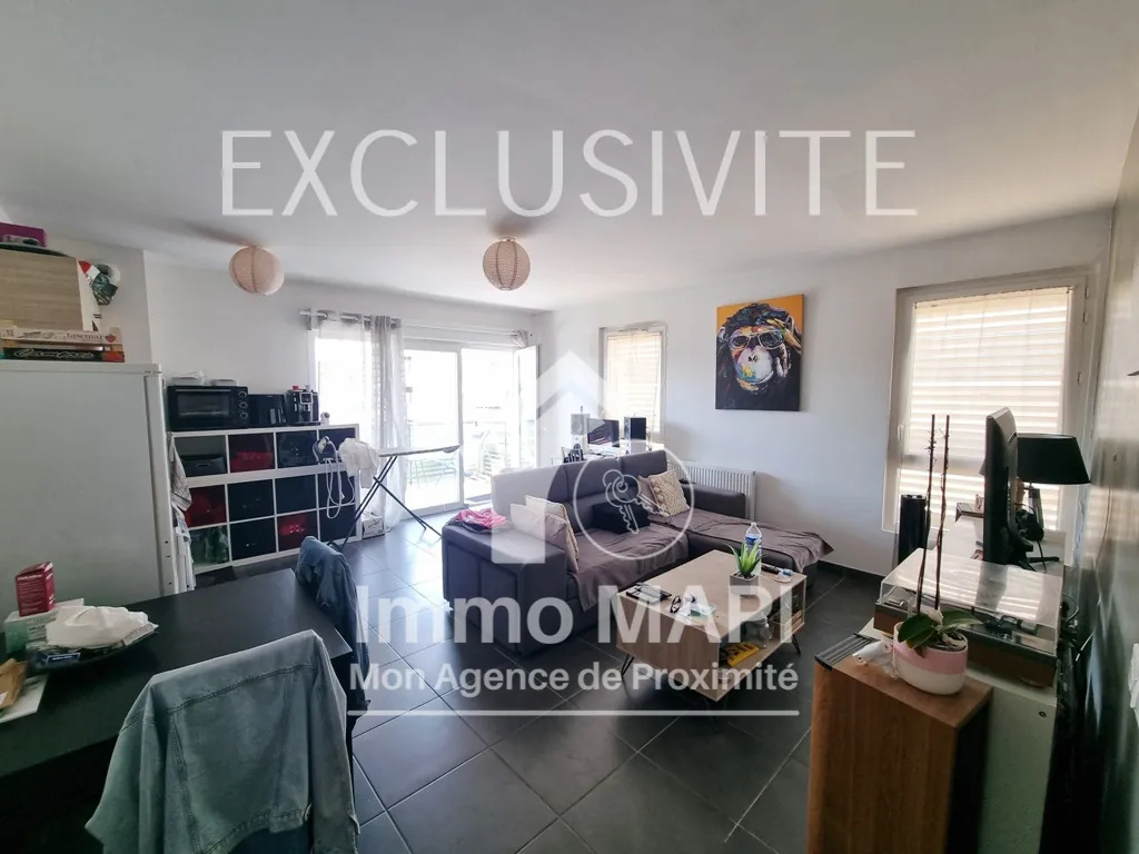 Appartement T2 à Juvignac avec terrasse, parking sécurisé et proximité tramway 