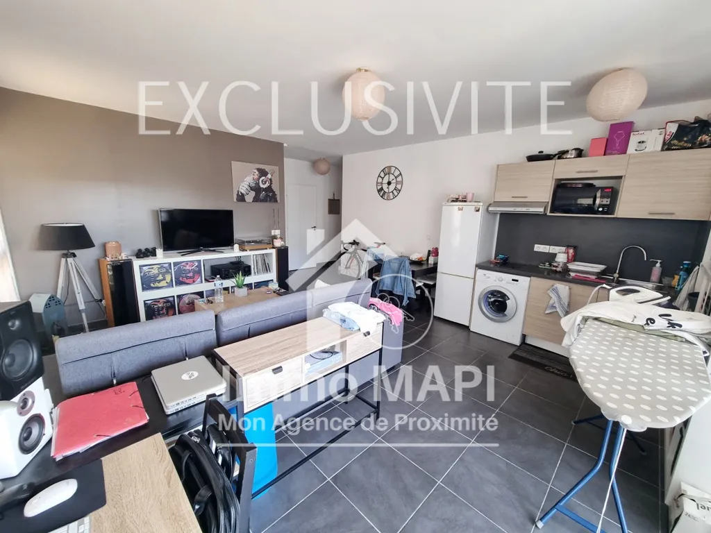 Appartement T2 à Juvignac avec terrasse, parking sécurisé et proximité tramway 