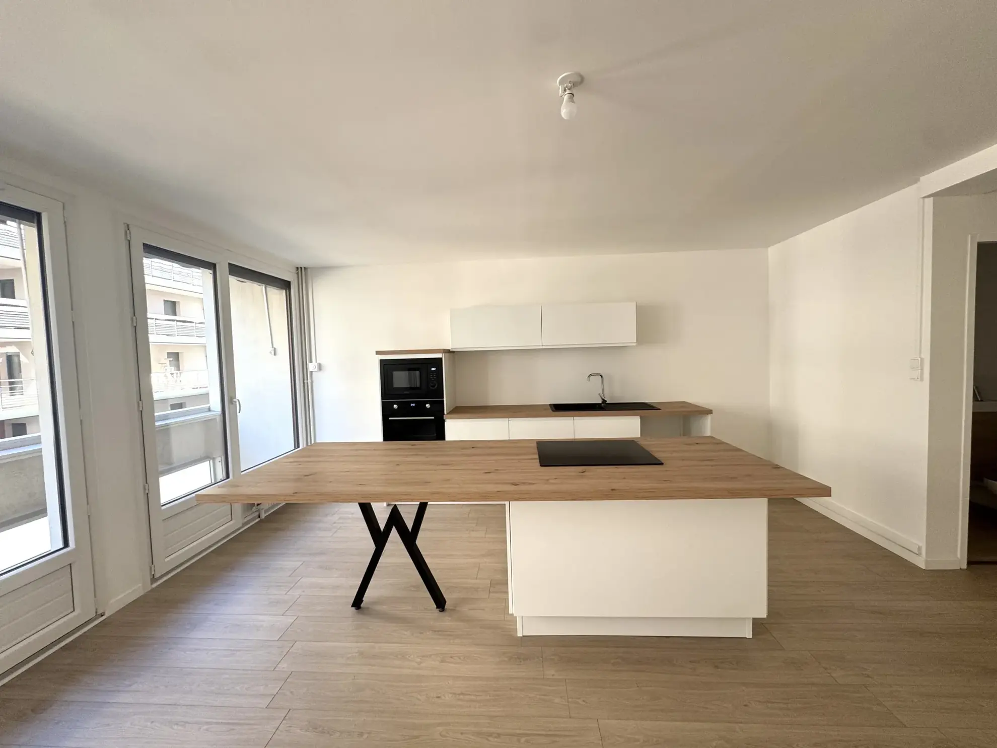 À vendre appartement T3 rénové avec balcon, cave et garage à Saint-Étienne - Cité du Design
