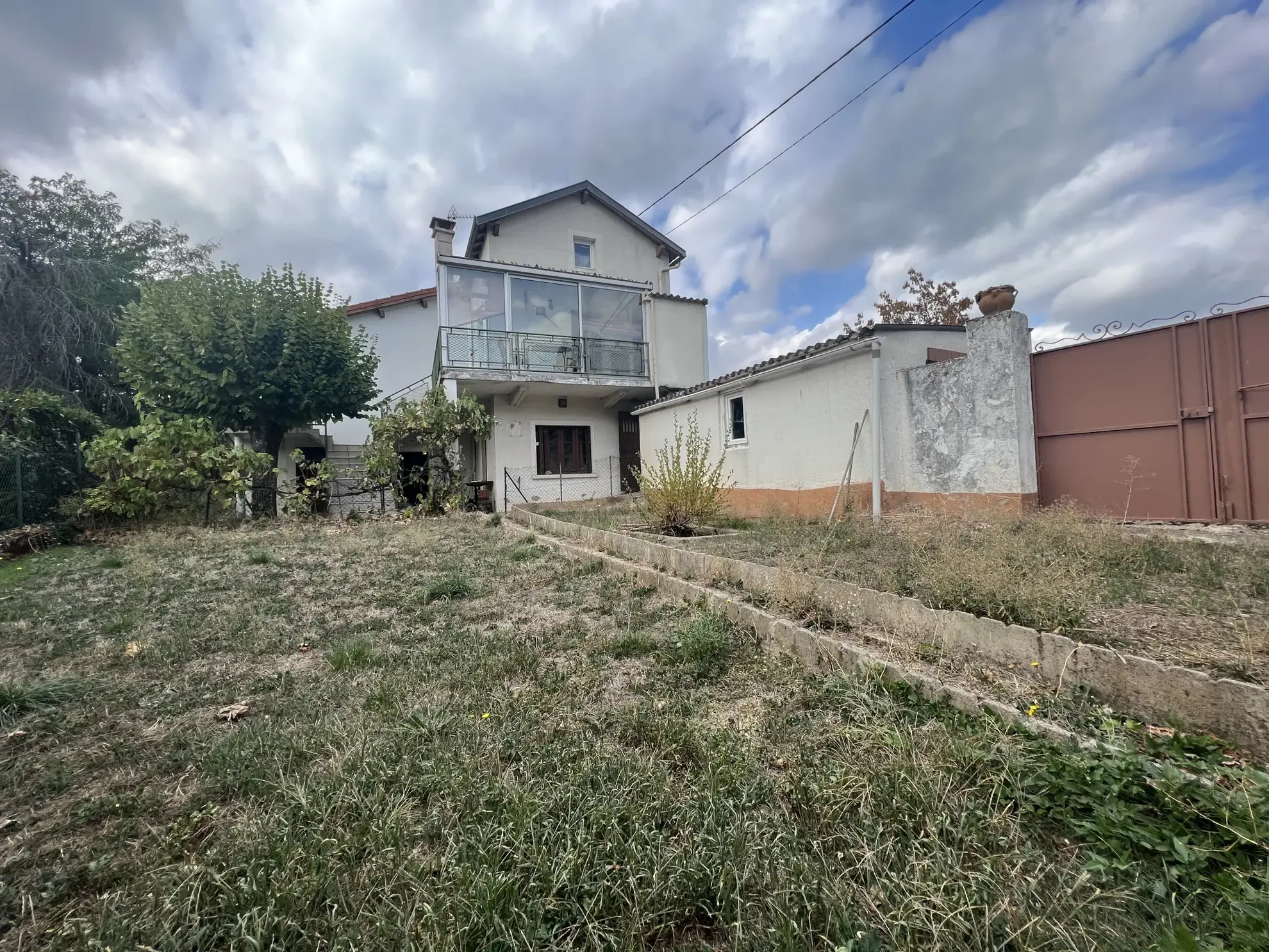 Maison de 86 m² avec jardin et garage à Millau 