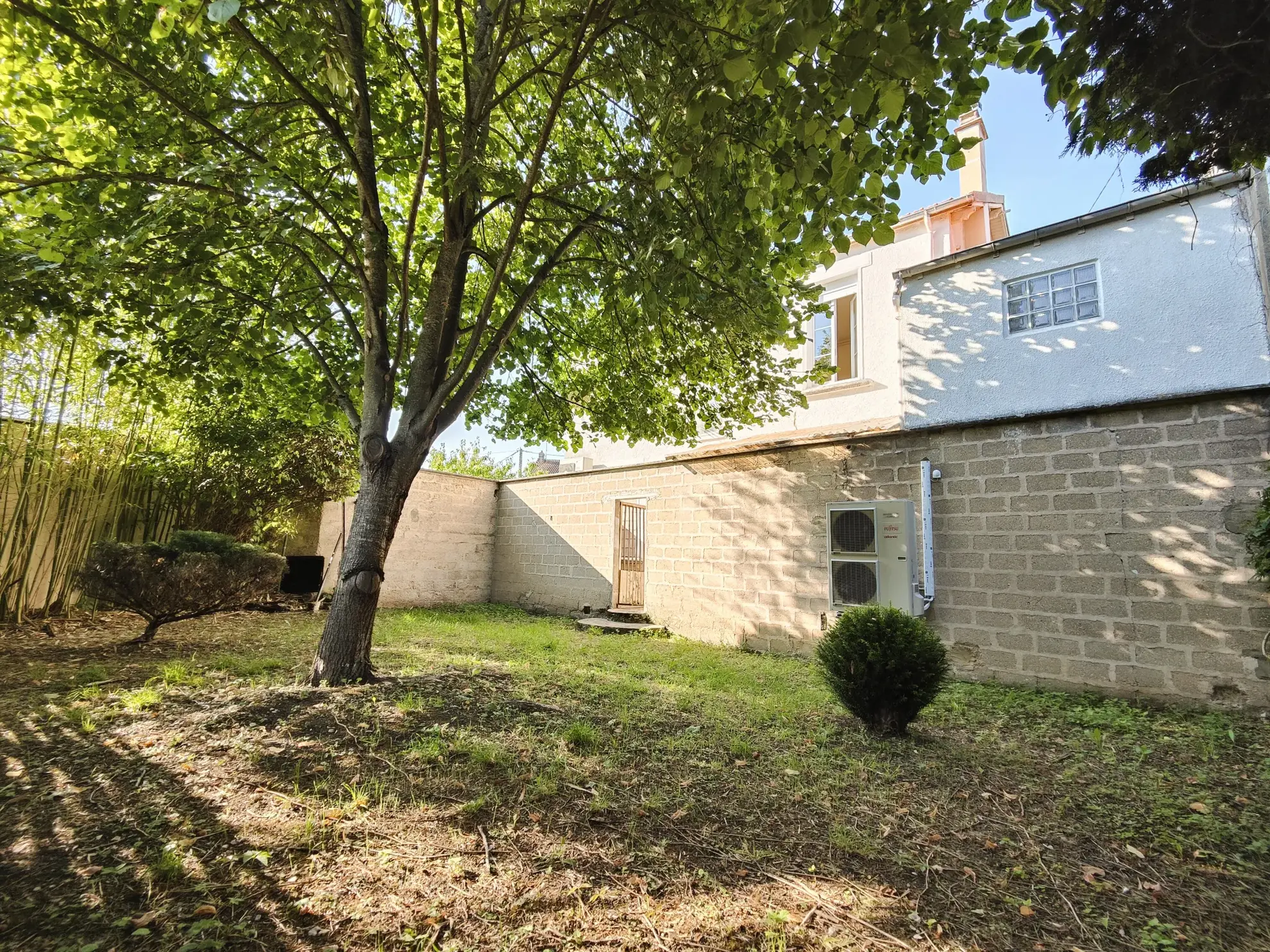 Maison avec local loué à Migennes - Investissement locatif et habitation