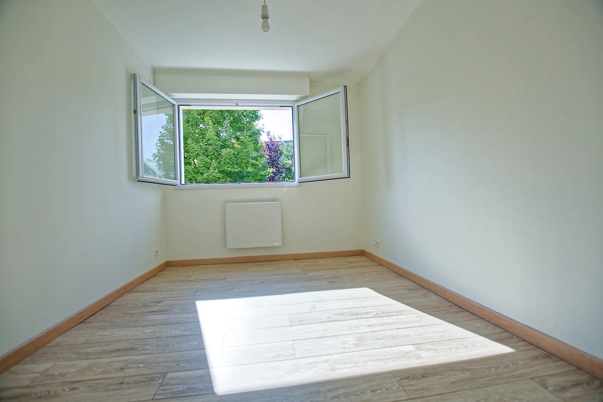 Appartement T3 rénové de 65 m² avec jardin privé à Pacé 