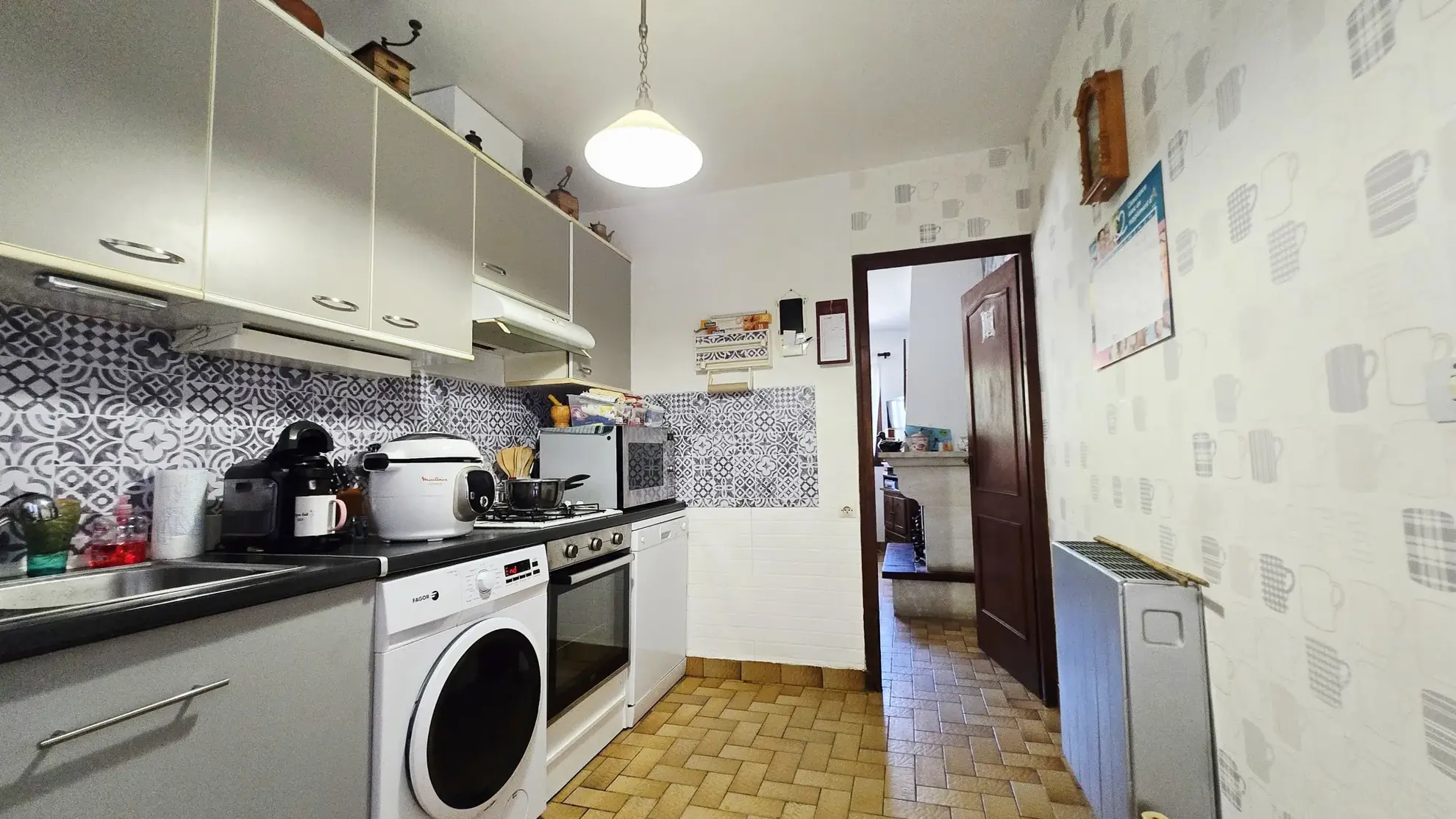 Maison plain-pied année 80 avec jardin, garage et 3 chambres à Sainte-Terre 