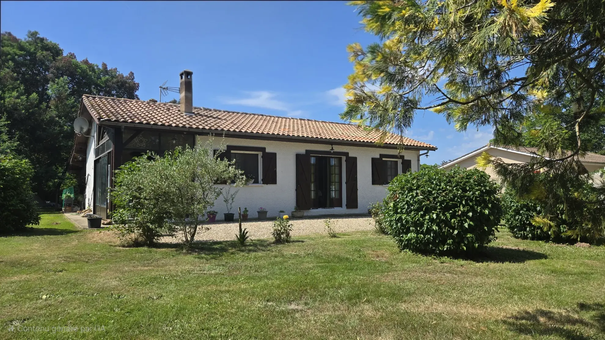 Maison plain-pied année 80 avec jardin, garage et 3 chambres à Sainte-Terre