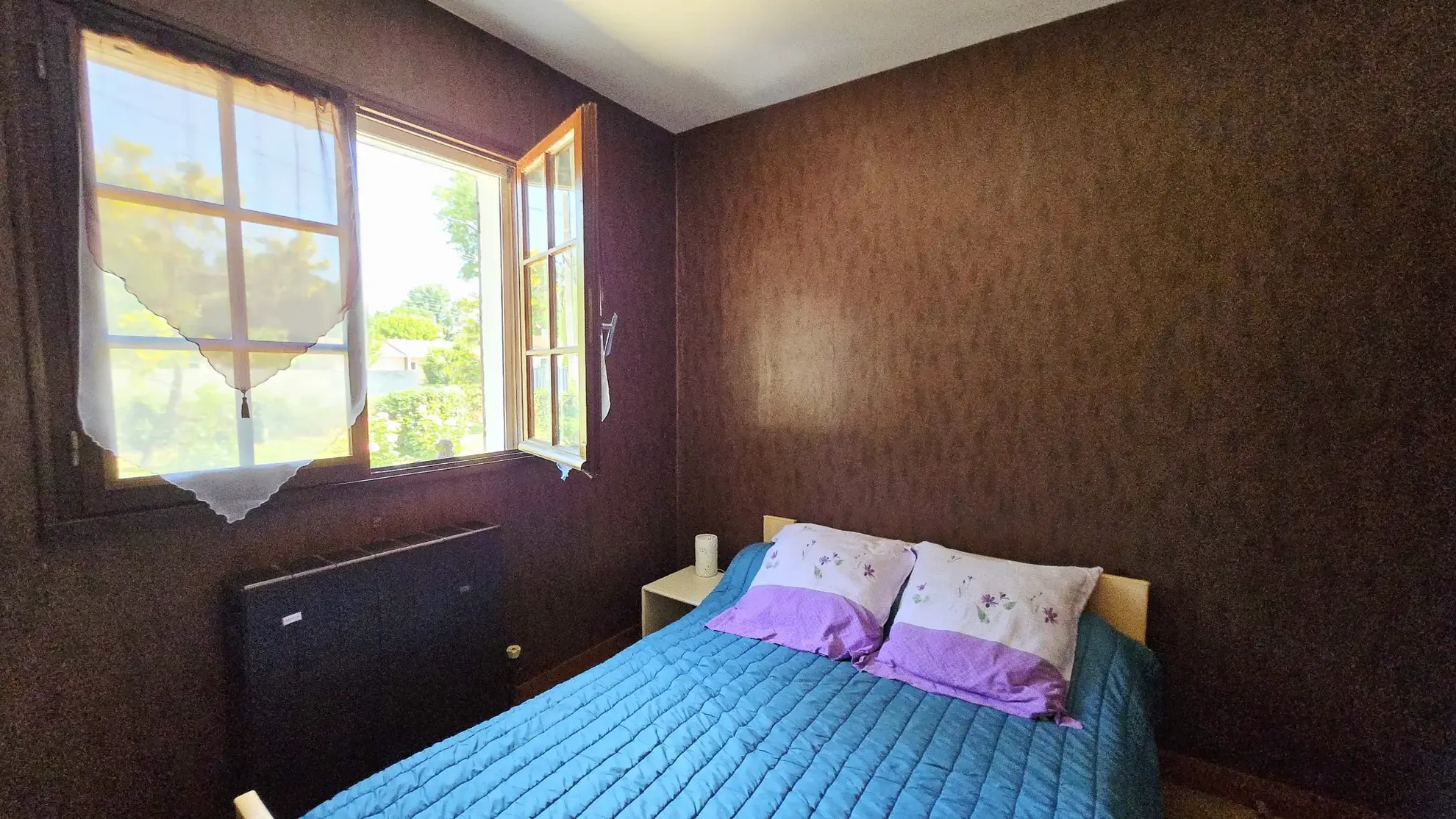 Maison plain-pied année 80 avec jardin, garage et 3 chambres à Sainte-Terre 