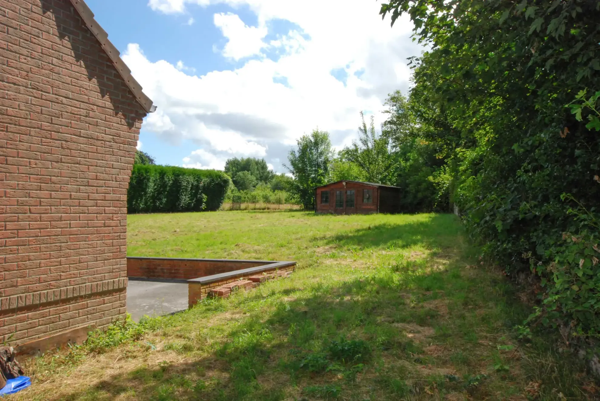 Villa en brique avec 4 chambres, double garage et grand sous-sol à Jeumont 