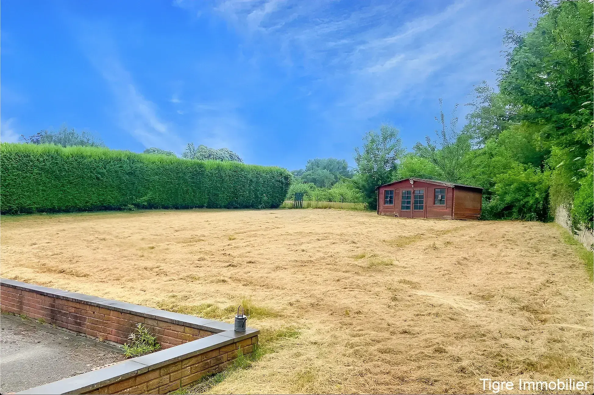 Villa en brique avec 4 chambres, double garage et grand sous-sol à Jeumont 
