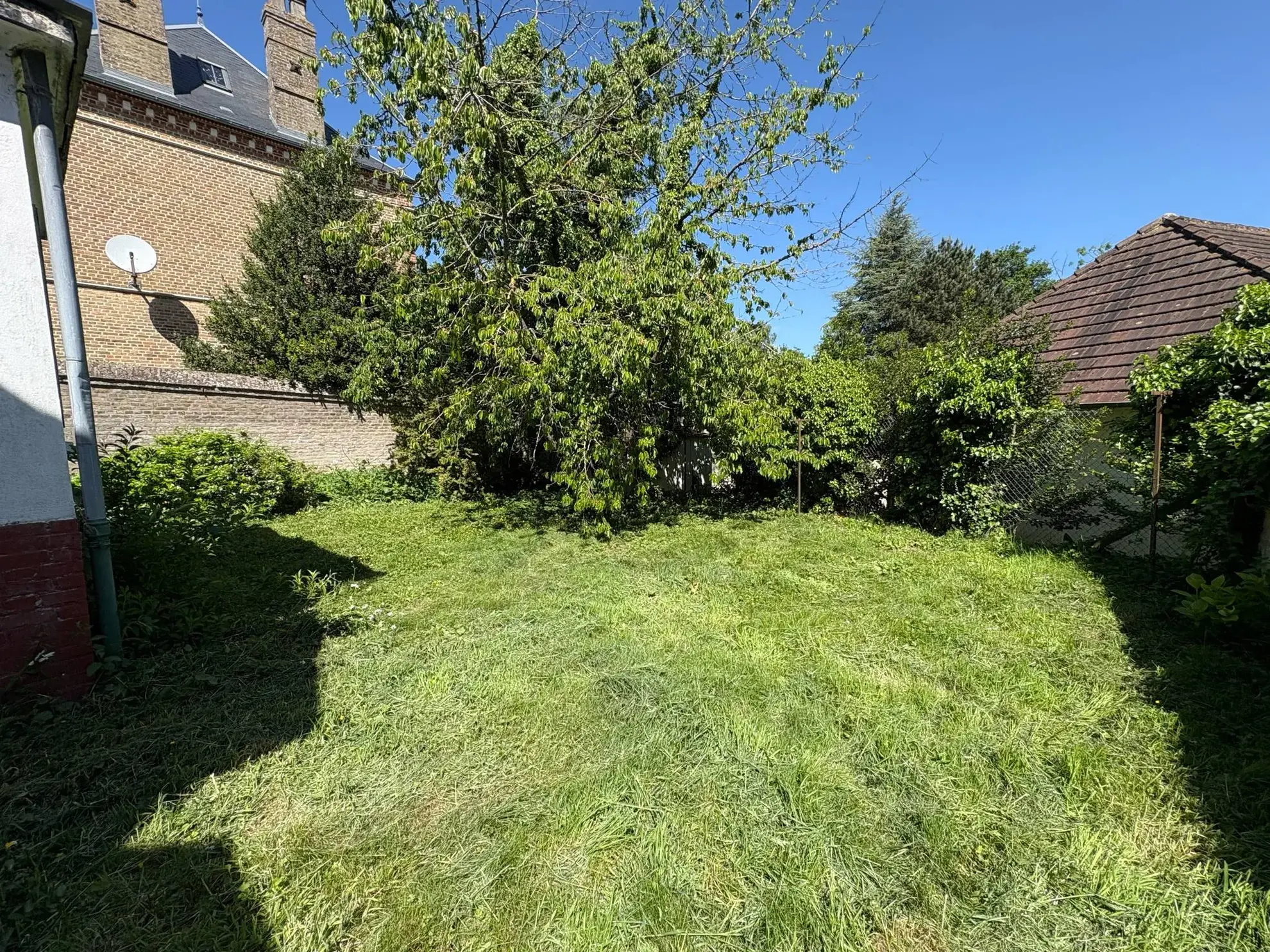 Maison à vendre à Longpré-les-Corps-Saints avec jardin et garage 