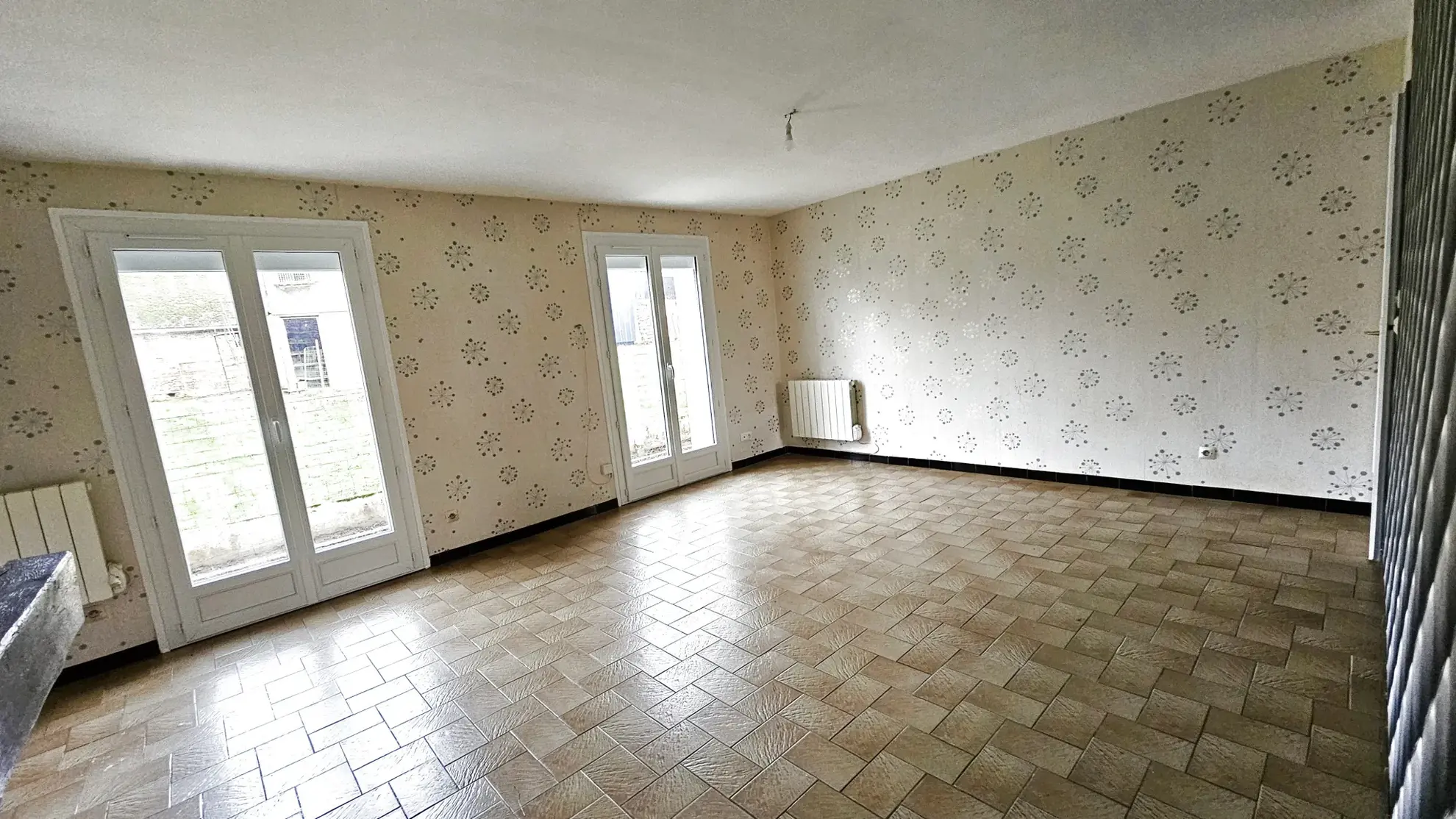 Maison de plain-pied avec 3 chambres et grand sous-sol à Longueville-sur-Scie 