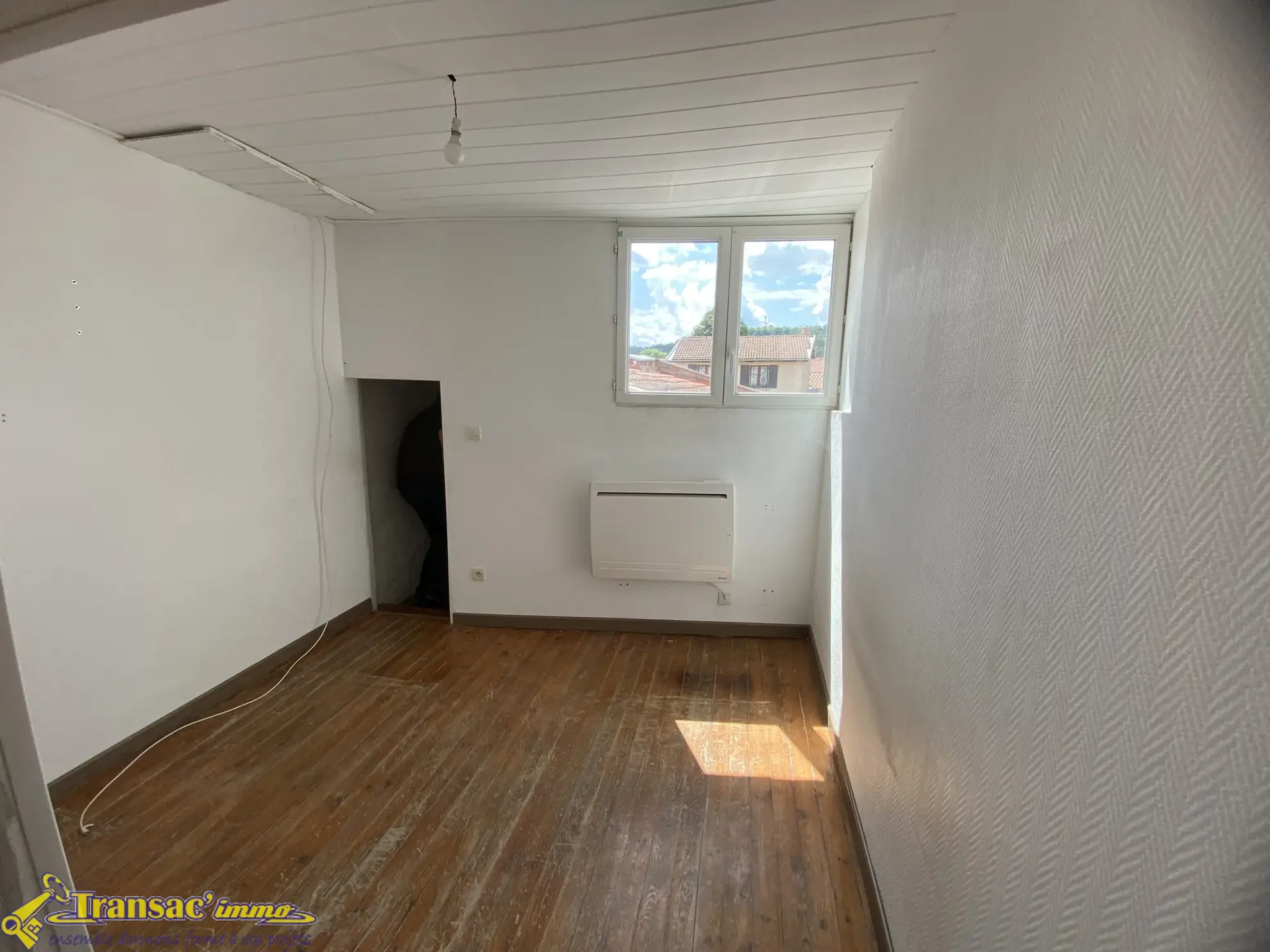 Maison de ville à Courpière de 76,8 m² avec jardin et bureau 