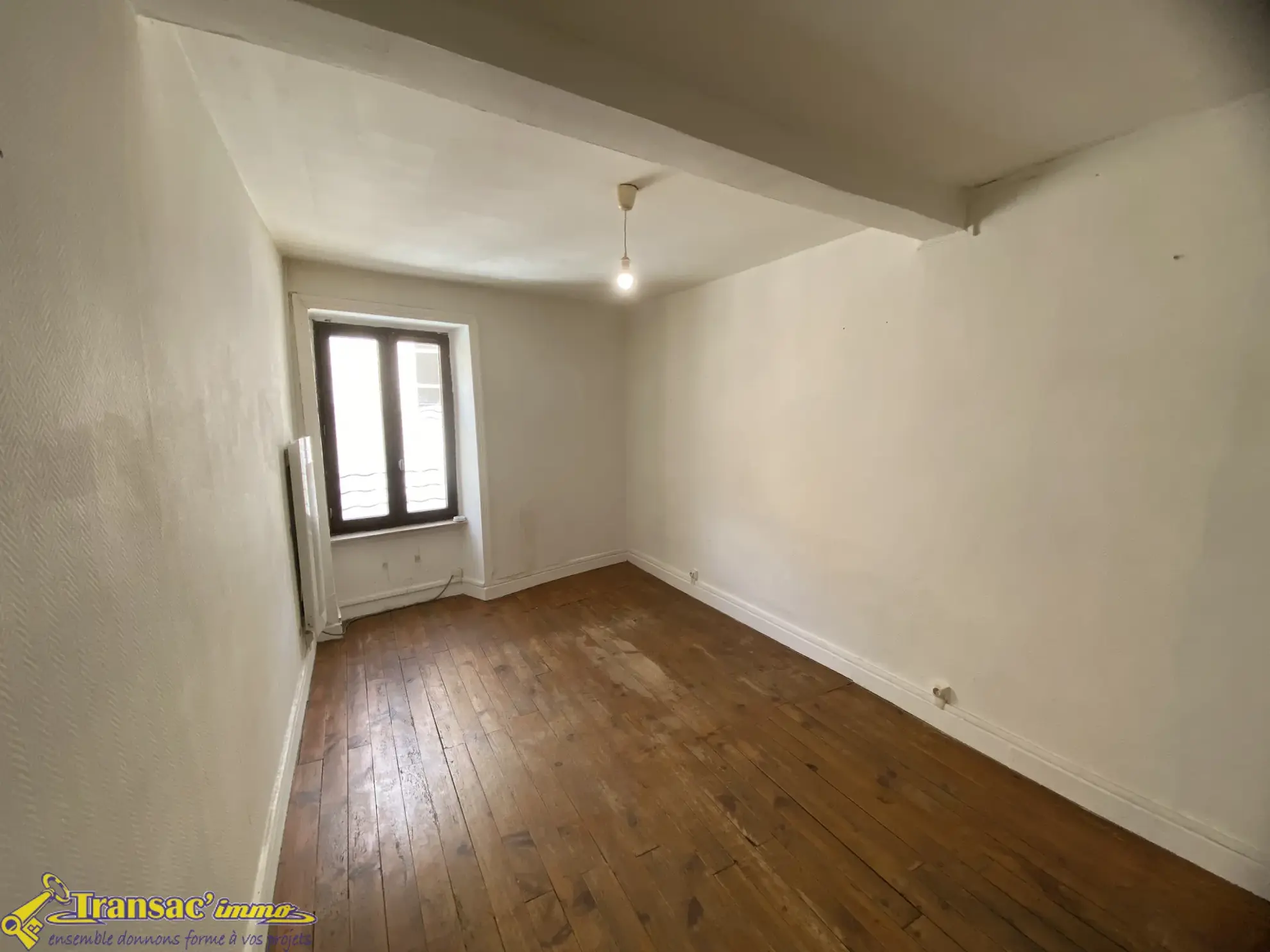 Maison de ville à Courpière de 76,8 m² avec jardin et bureau 