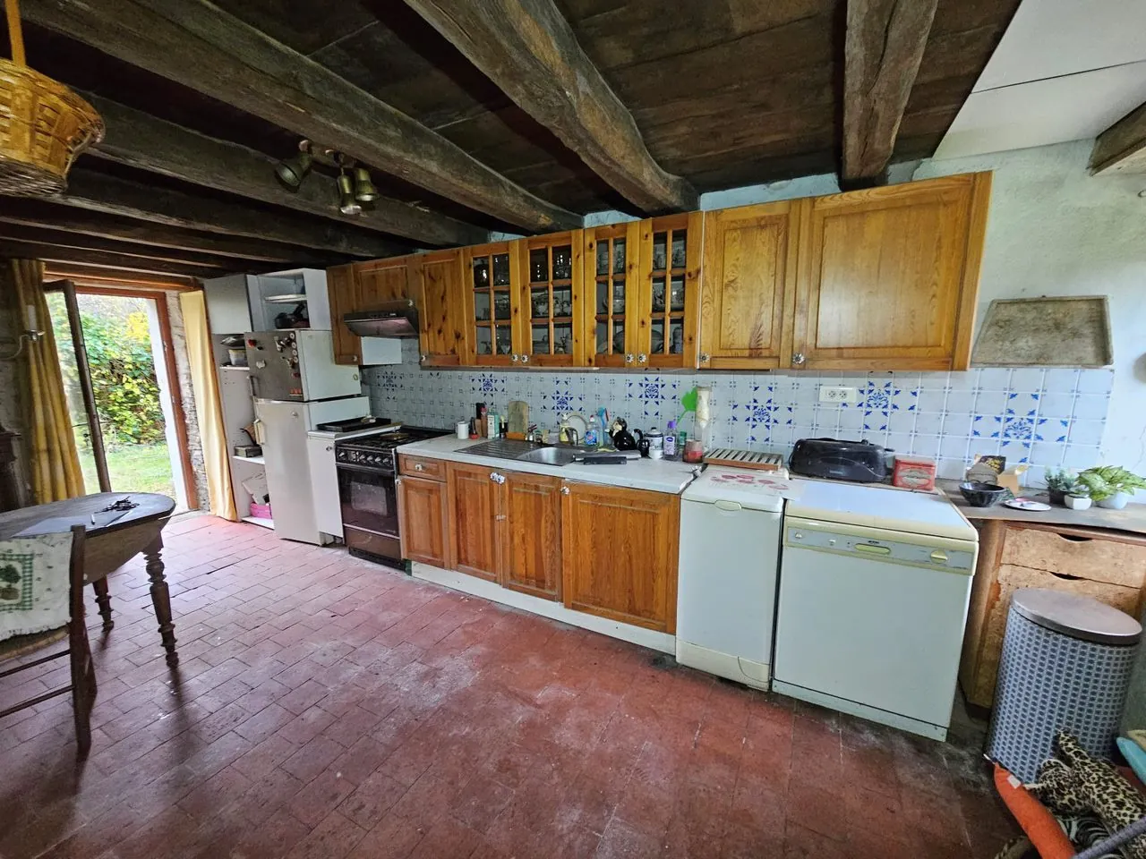 Maison à vendre avec jardin, dépendances et garage à Bannegon 