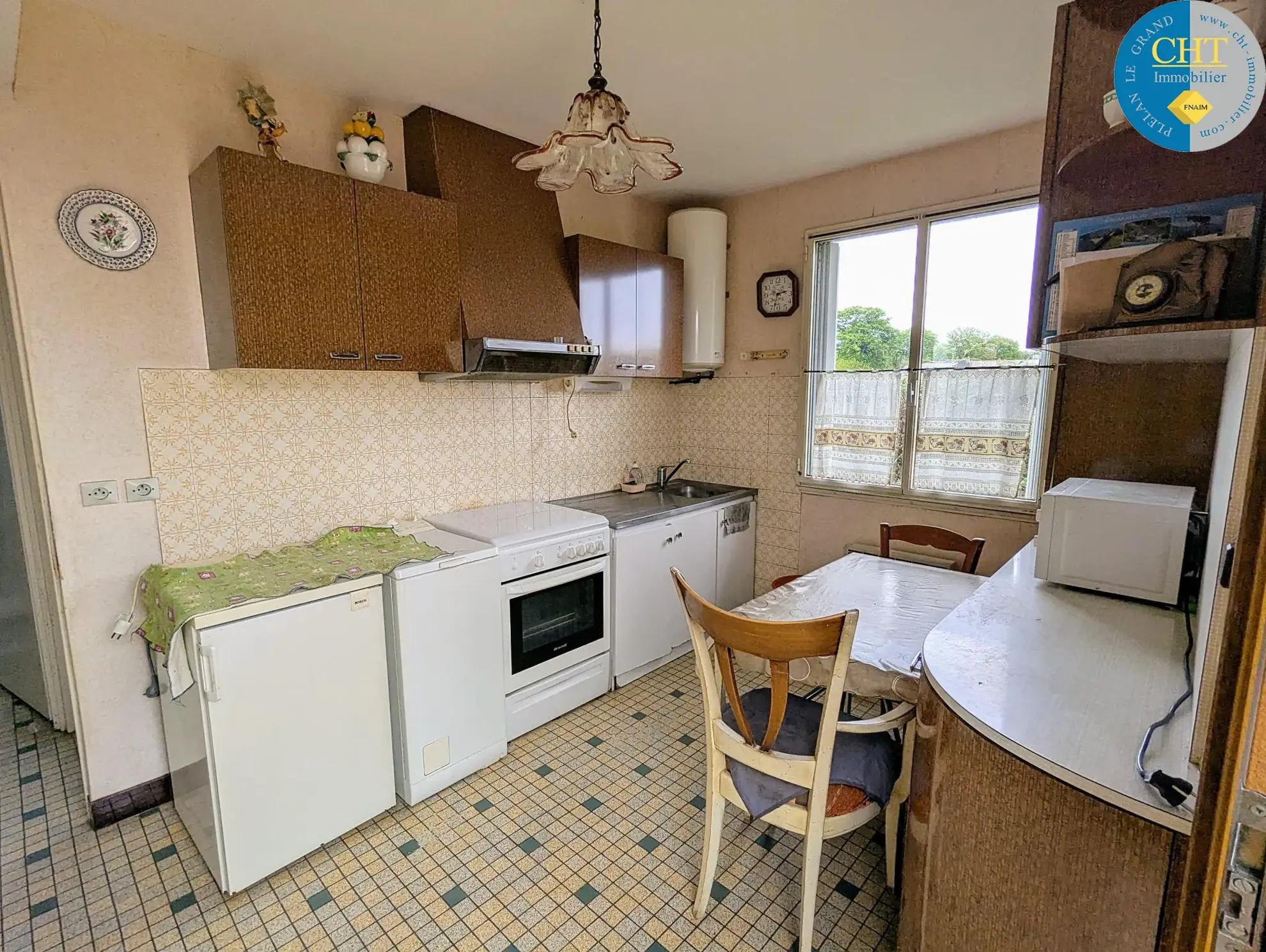 Ensemble immobilier à rénover à Campel avec maison et terrain spacieux 