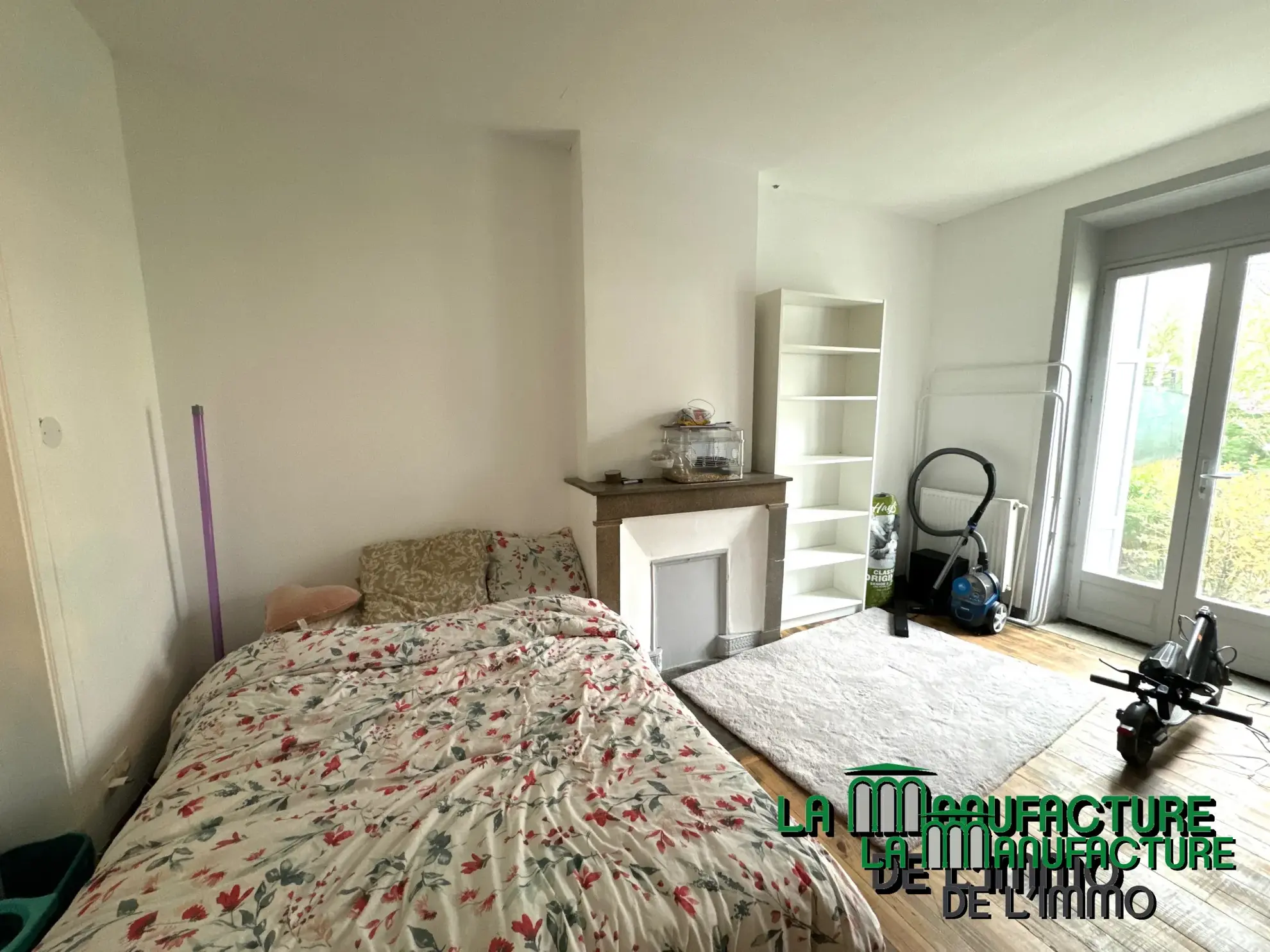 Immeuble de rapport à Unieux avec trois logements et jardin - Opportunité d'investissement rentable 