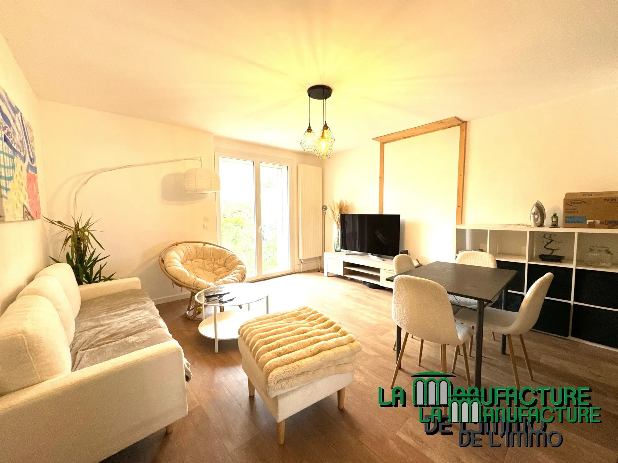 Immeuble de rapport à Unieux avec trois logements et jardin - Opportunité d'investissement rentable 