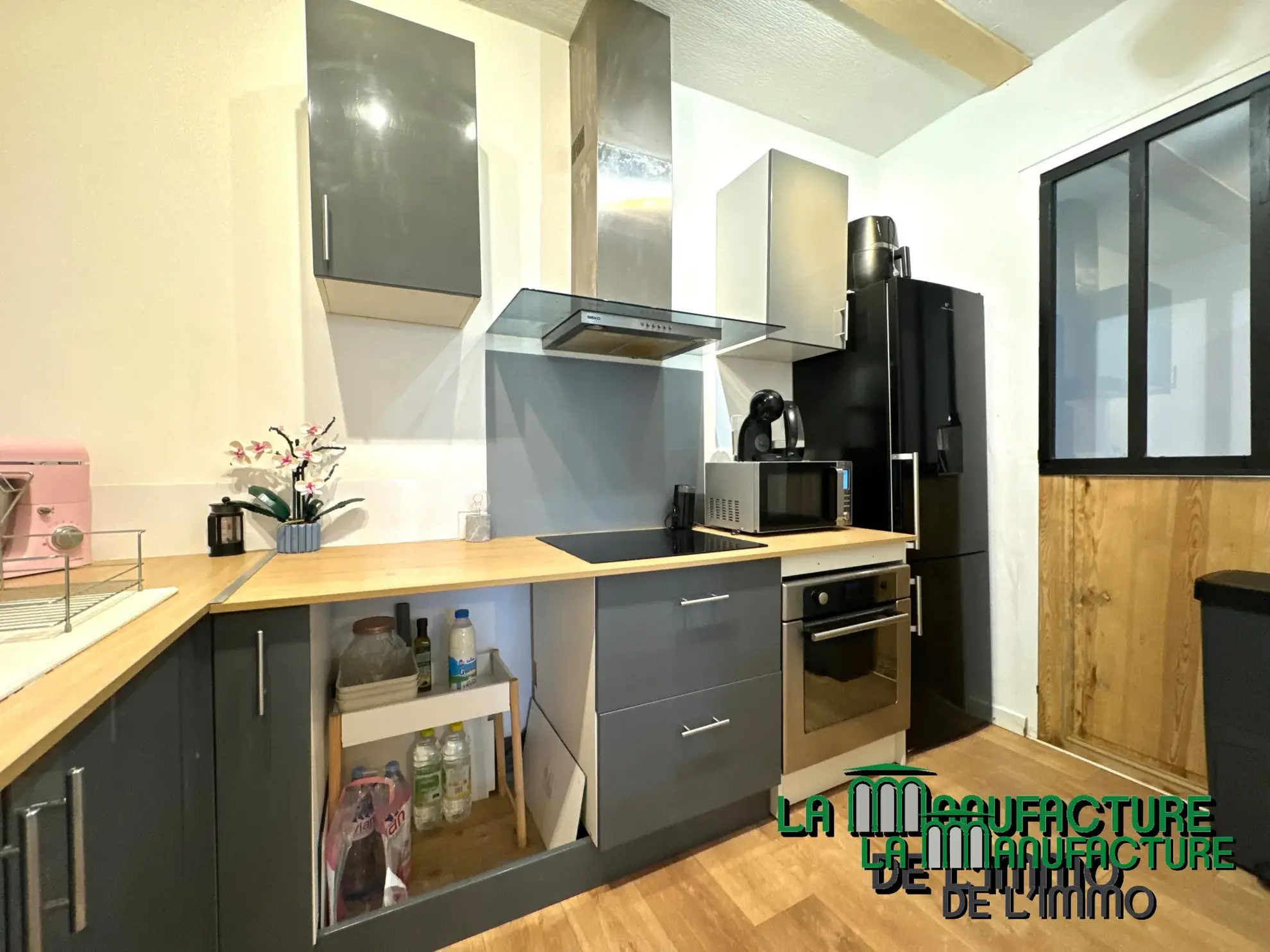 Immeuble de rapport à Unieux avec trois logements et jardin - Opportunité d'investissement rentable 