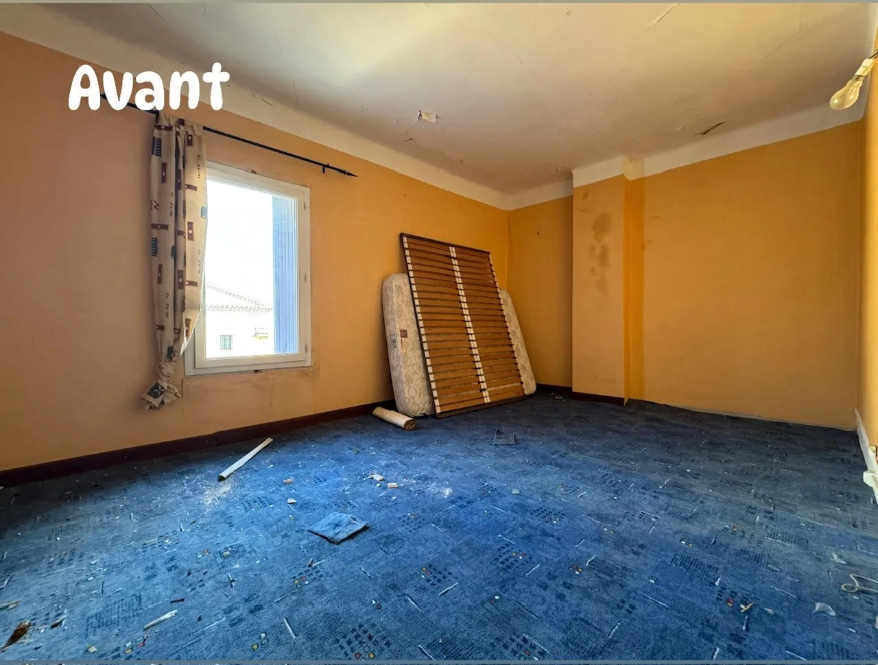 Maison de village à rénover à Milhaud avec cour et cave 