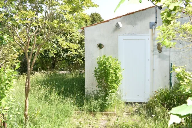 Terrain de loisirs de 222 m² avec mobil-home et local en dur à Saint Georges-Foulerot 