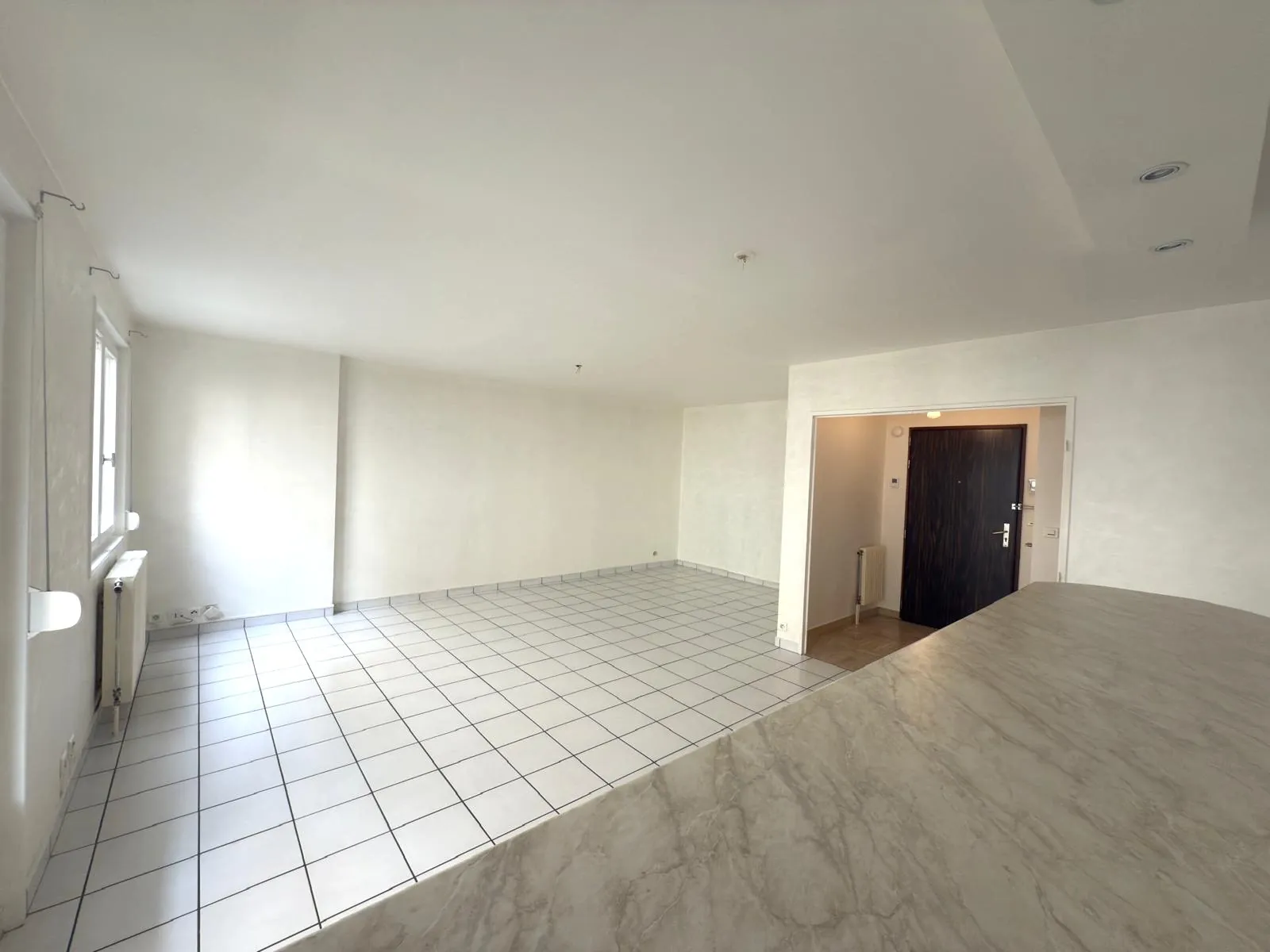 Appartement F2 bis avec balcon, cave et garage à Saint-Étienne, secteur recherché 