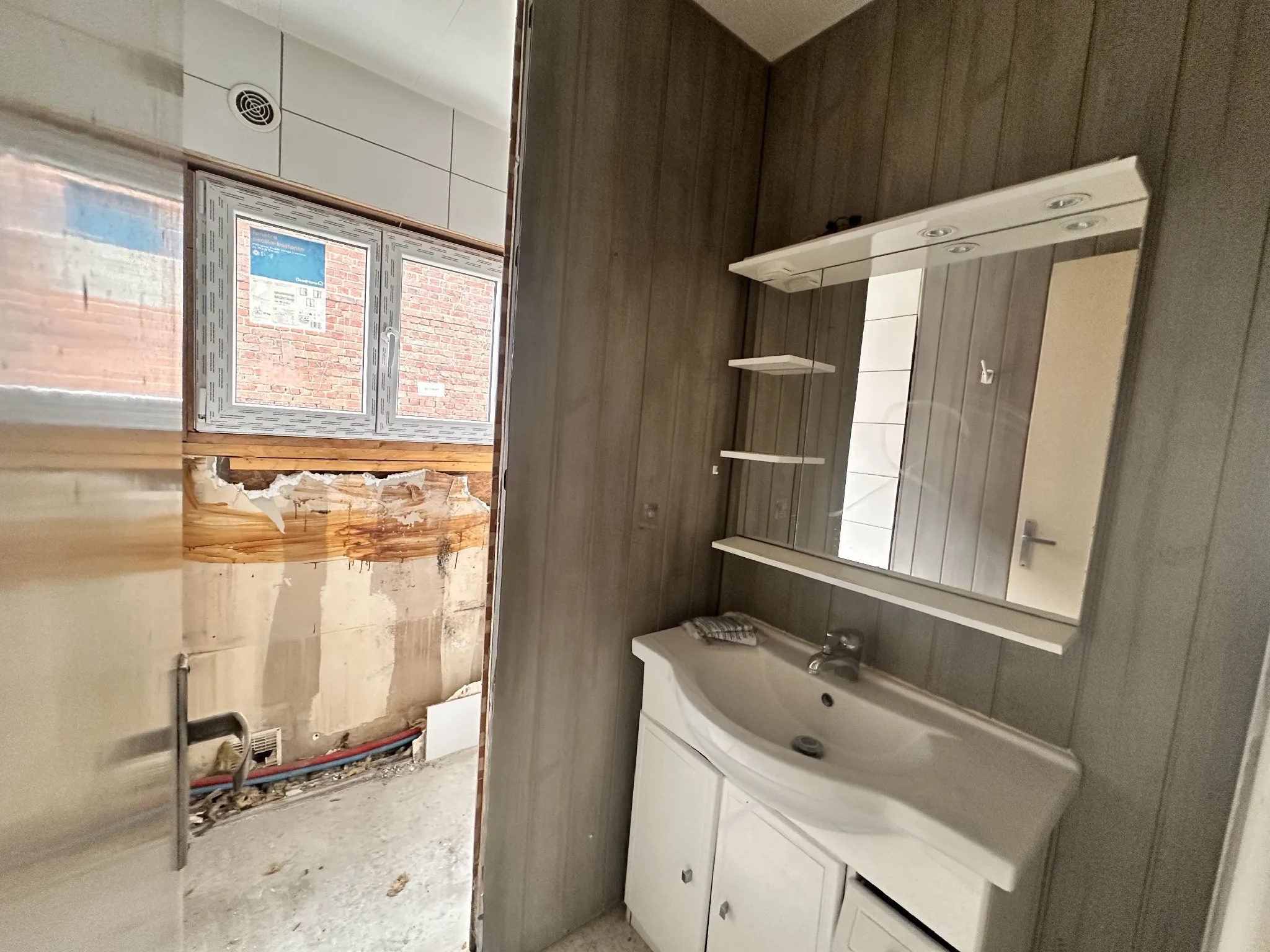 Maison à rénover à Douai avec jardin et potentiel de personnalisation 