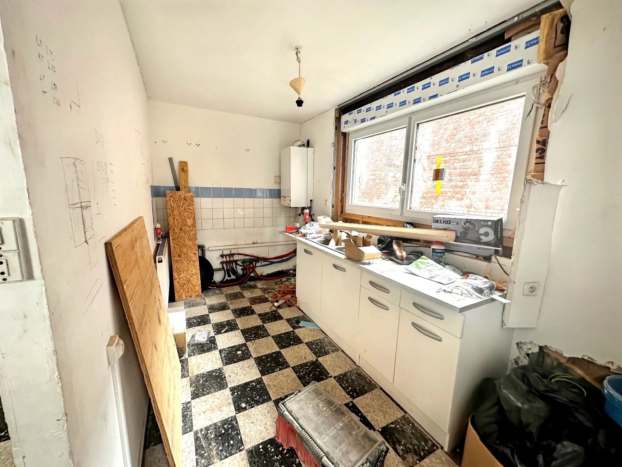 Maison à rénover à Douai avec jardin et potentiel de personnalisation 