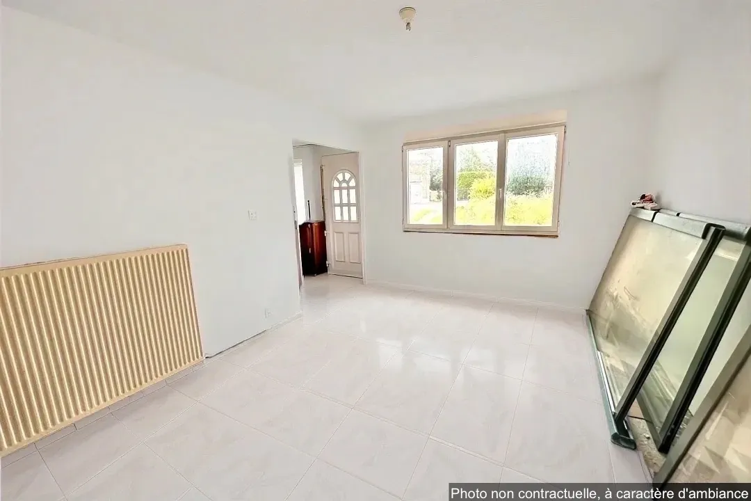 Maison à rénover à Douai avec jardin et potentiel de personnalisation 