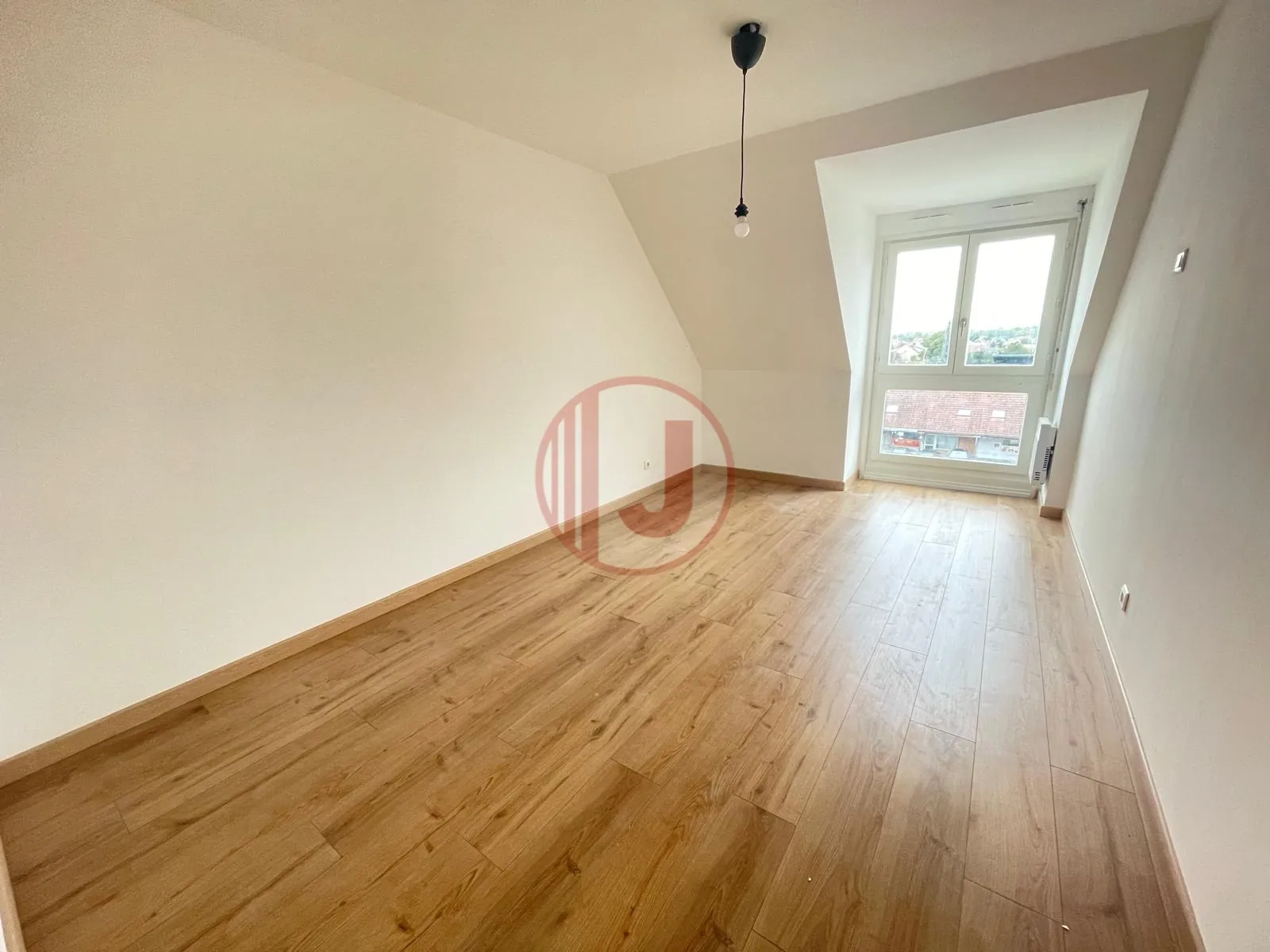 Appartement T3 de 63 m² à Wittenheim centre avec garage et cave 