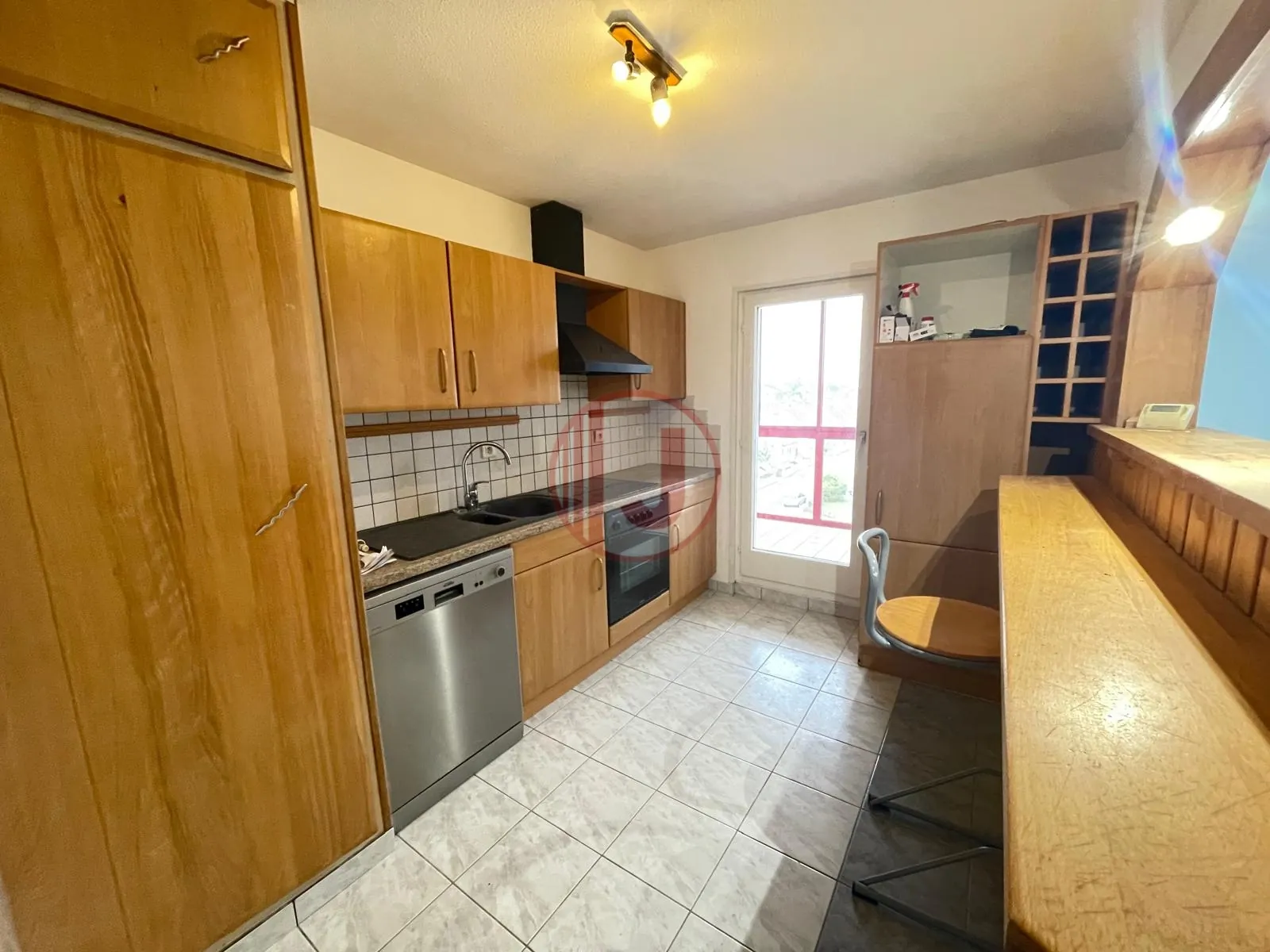 Appartement T3 de 63 m² à Wittenheim centre avec garage et cave 