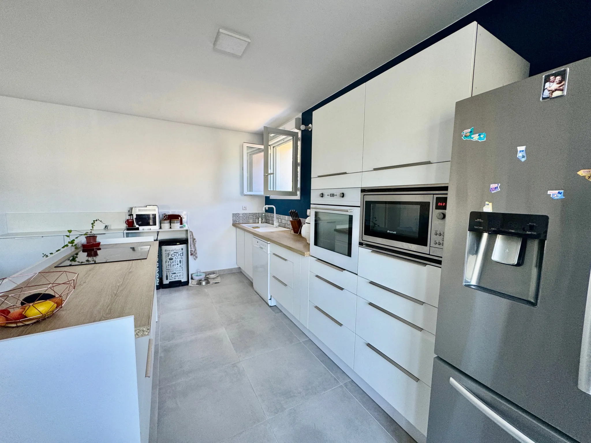 Maison rénovée de 122 m² avec 4 chambres, jardin et garage à Saint-Laurent-des-Arbres 