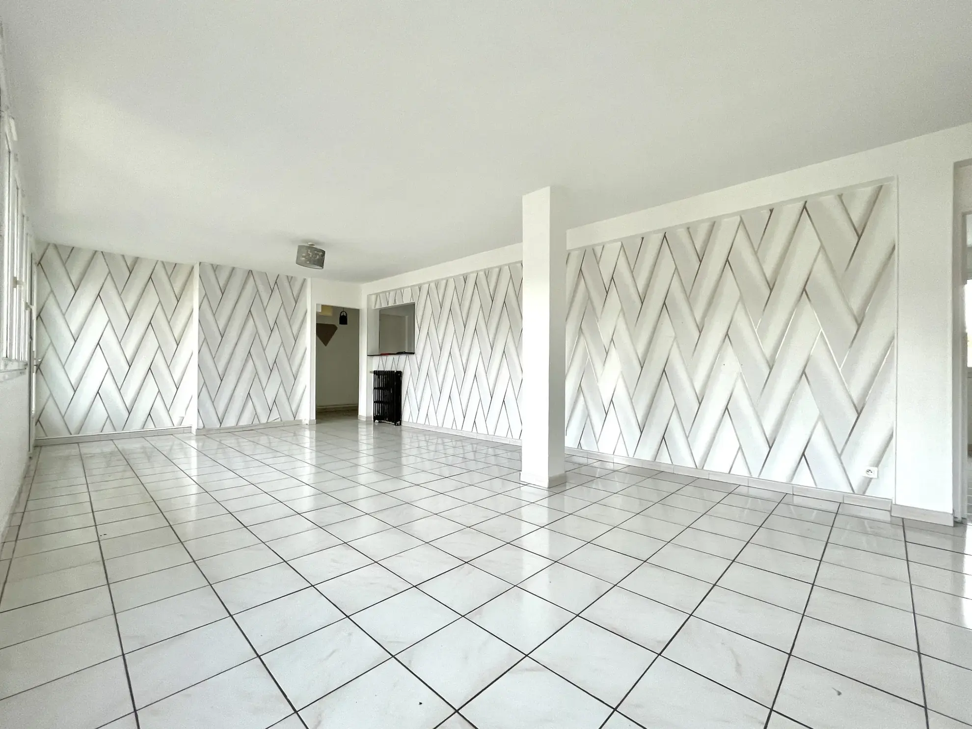 Grand appartement lumineux à vendre à St Quentin avec balcon et cave 