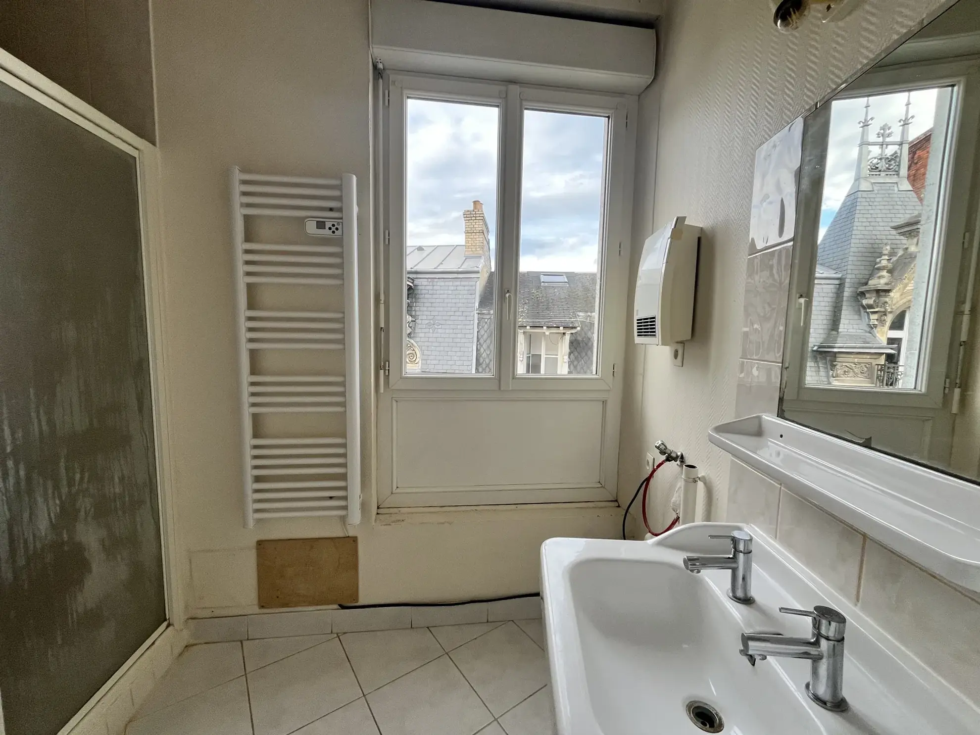 Appartement T3 de 63m² en centre-ville du Mans avec cachet et rénovation à prévoir 