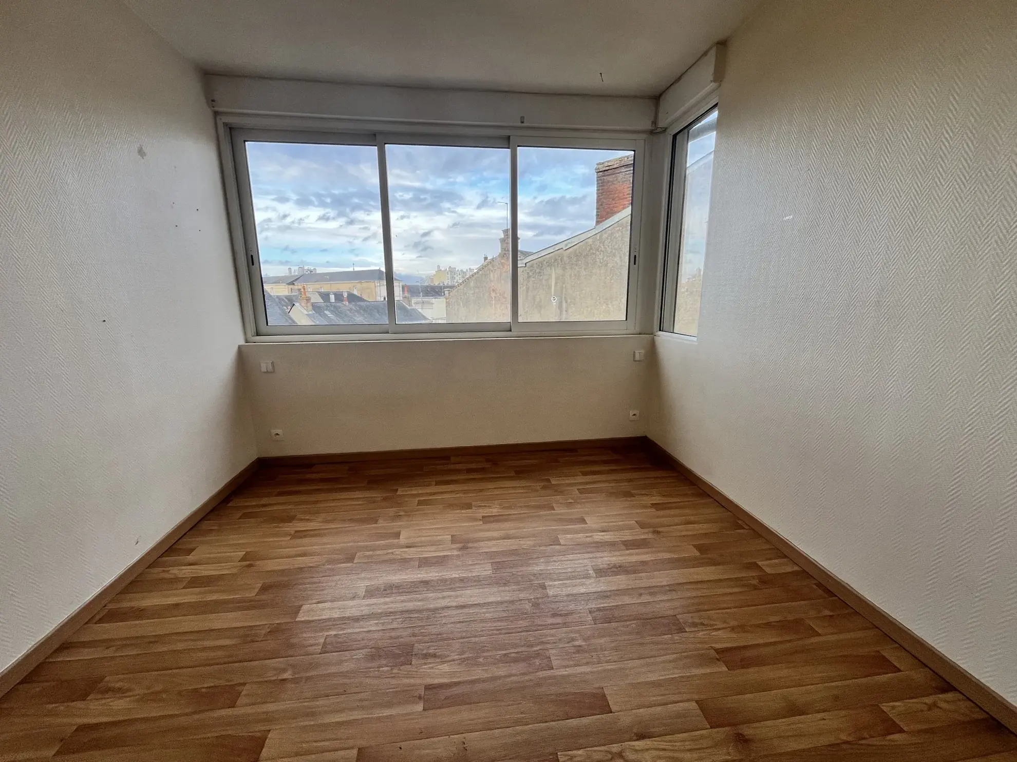 Appartement T3 de 63m² en centre-ville du Mans avec cachet et rénovation à prévoir 