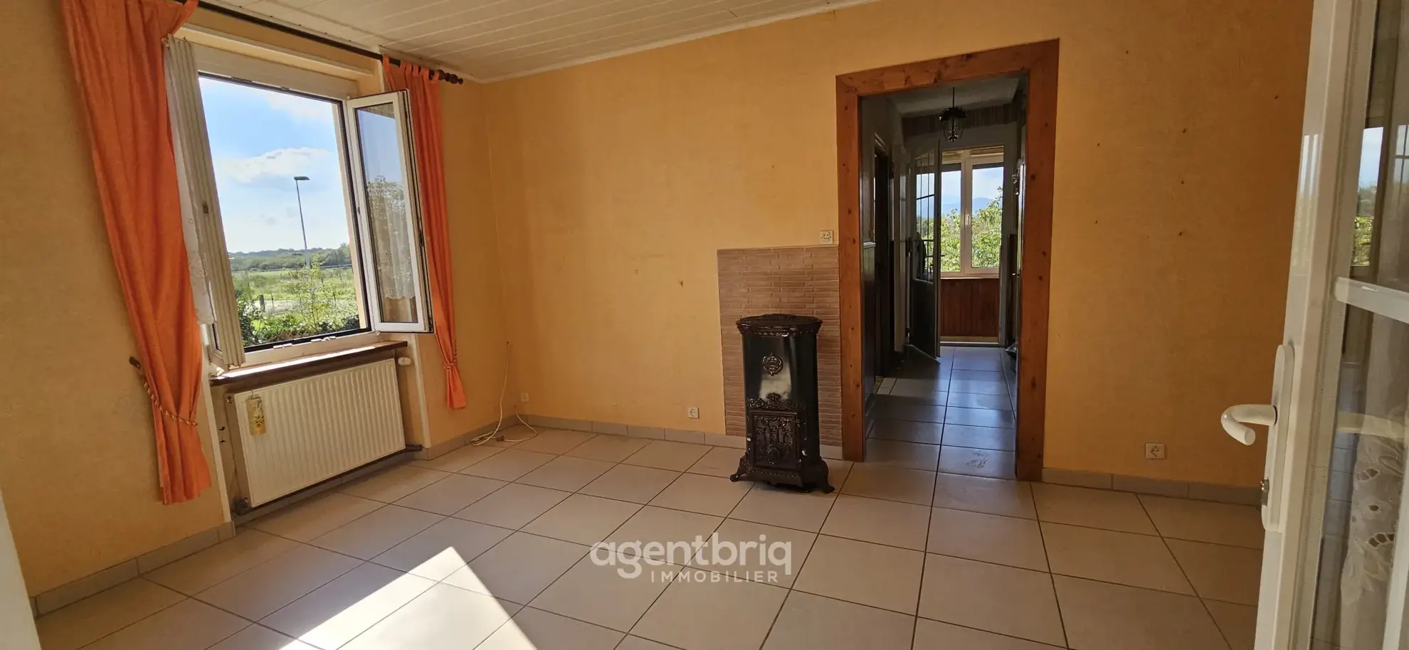 Maison mitoyenne à Wittelsheim avec vue sur les Vosges – Opportunité à rénover 