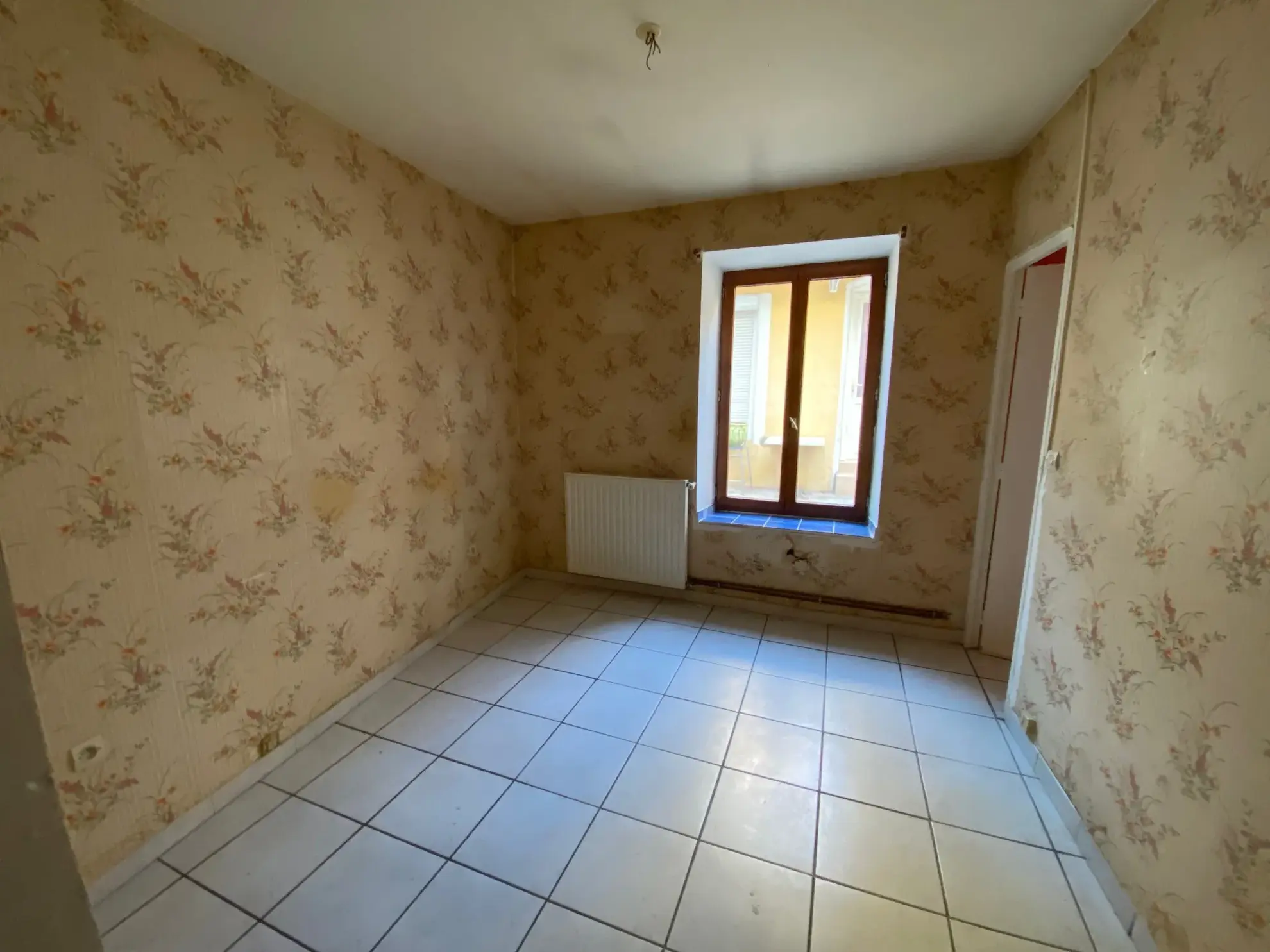 Appartement T2 bis à rénover de 48 m² au centre de Nîmes 