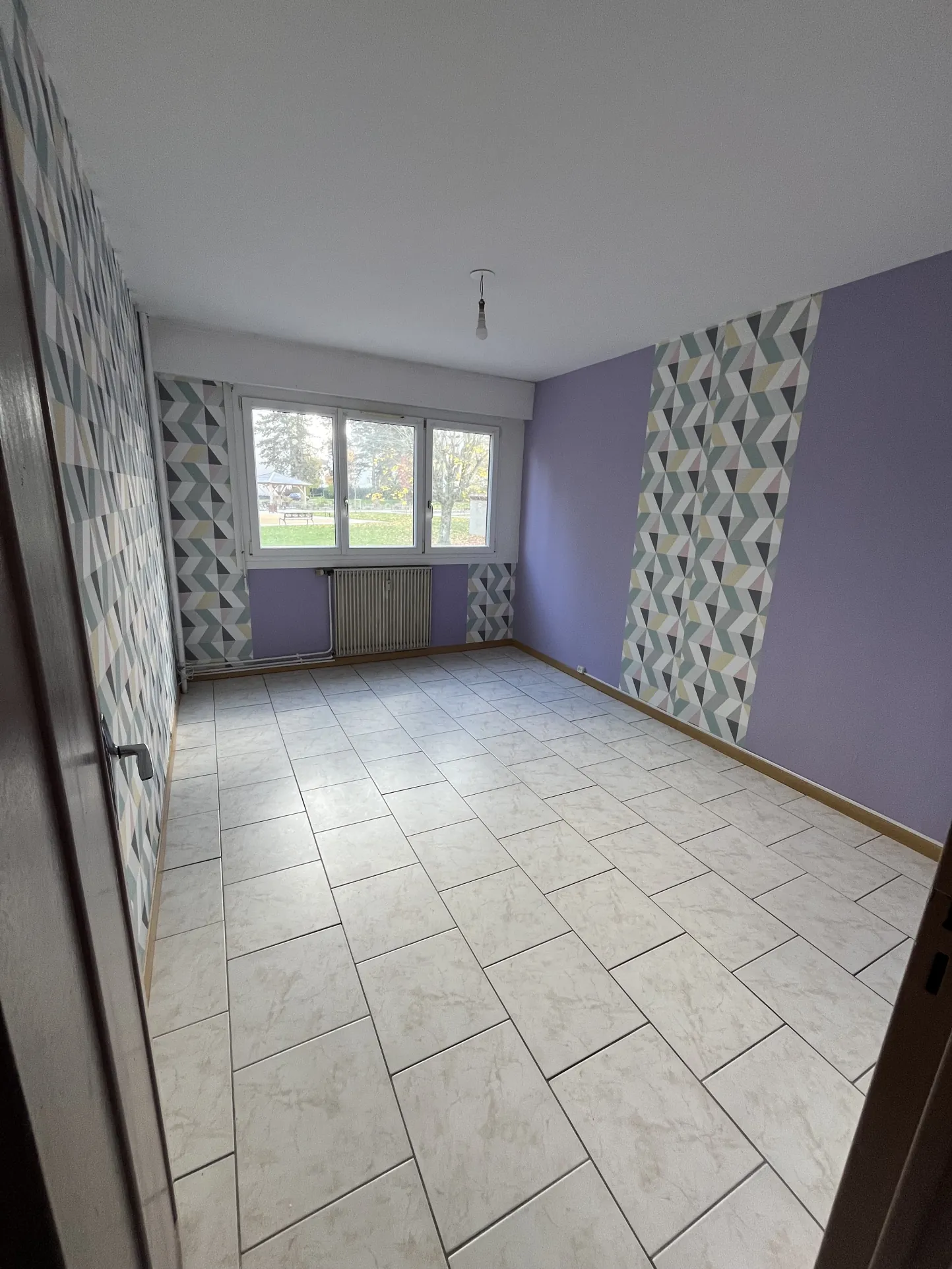 Appartement à rénover de 91,43 m² à Golbey, secteur recherché 
