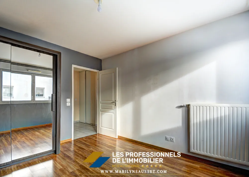 Appartement 3 pièces de 60 m² avec double parking à Meyzieu 