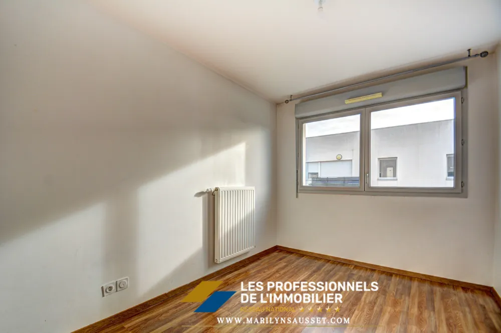 Appartement 3 pièces de 60 m² avec double parking à Meyzieu 