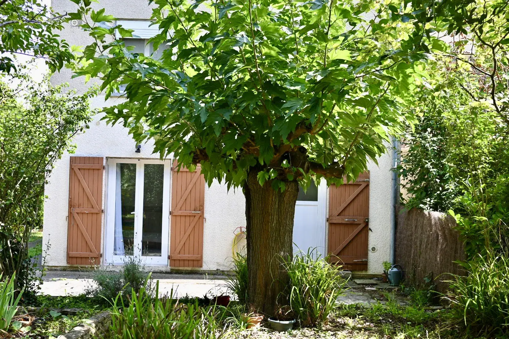 Charmante maison de 129 m² avec jardin et garage à Carcassonne 
