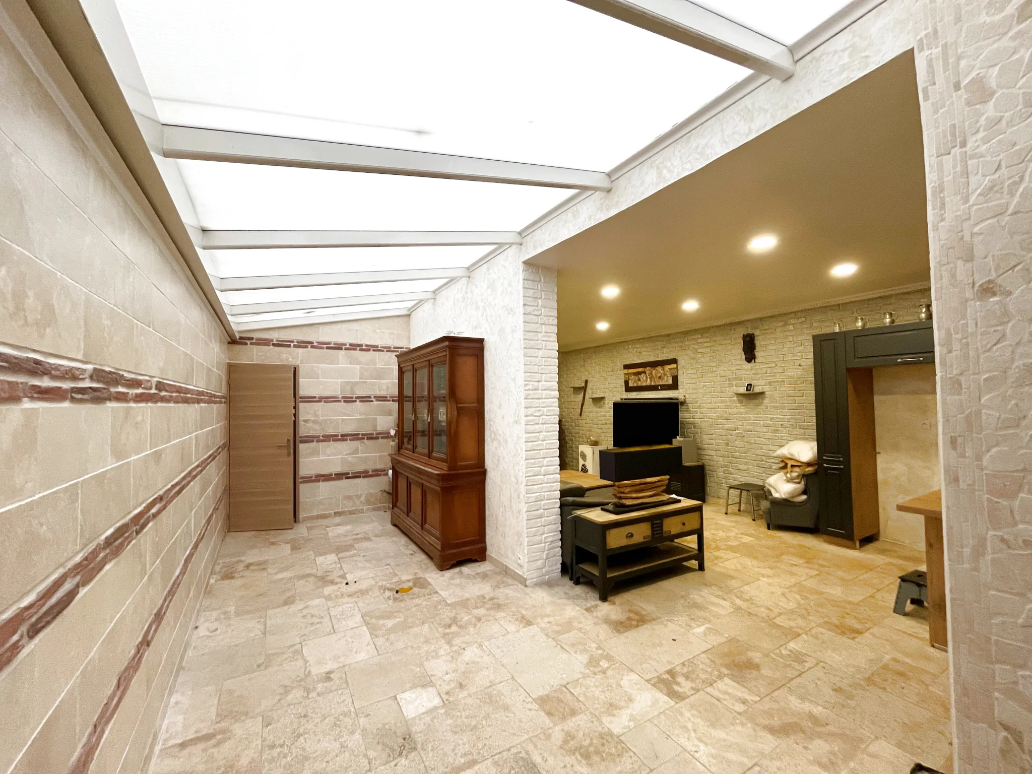 Grande maison de ville à Billy Montigny avec jardin, garage et plusieurs chambres 