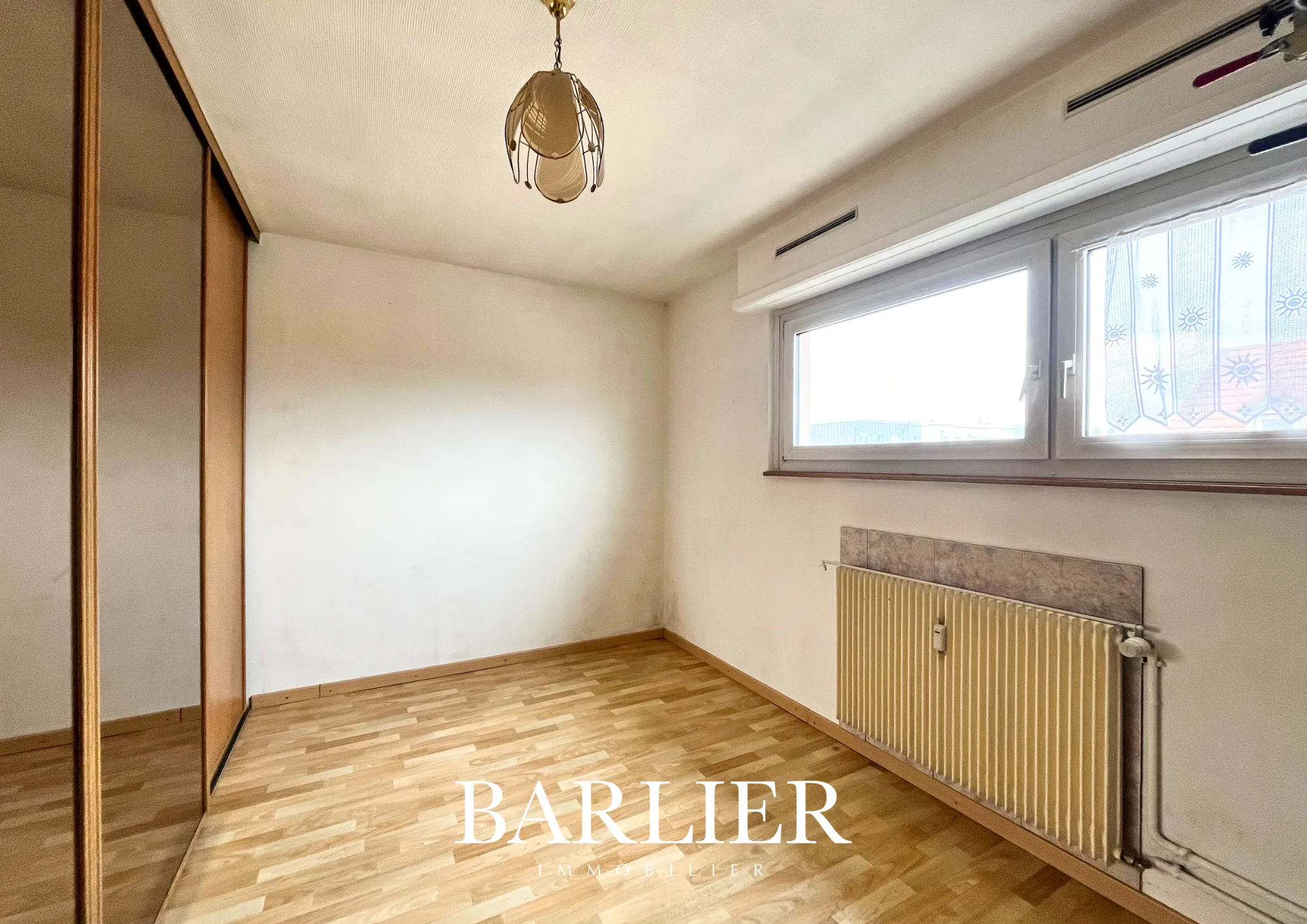 Appartement 3 pièces à Strasbourg Koenigshoffen - 67,83 m² avec Balcon et Parking 