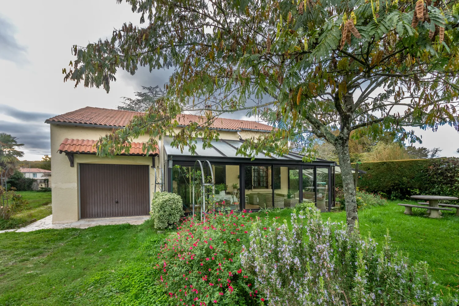 Maison 4 chambres avec véranda, garage et jardin clos à La Chapelle-des-Pots 