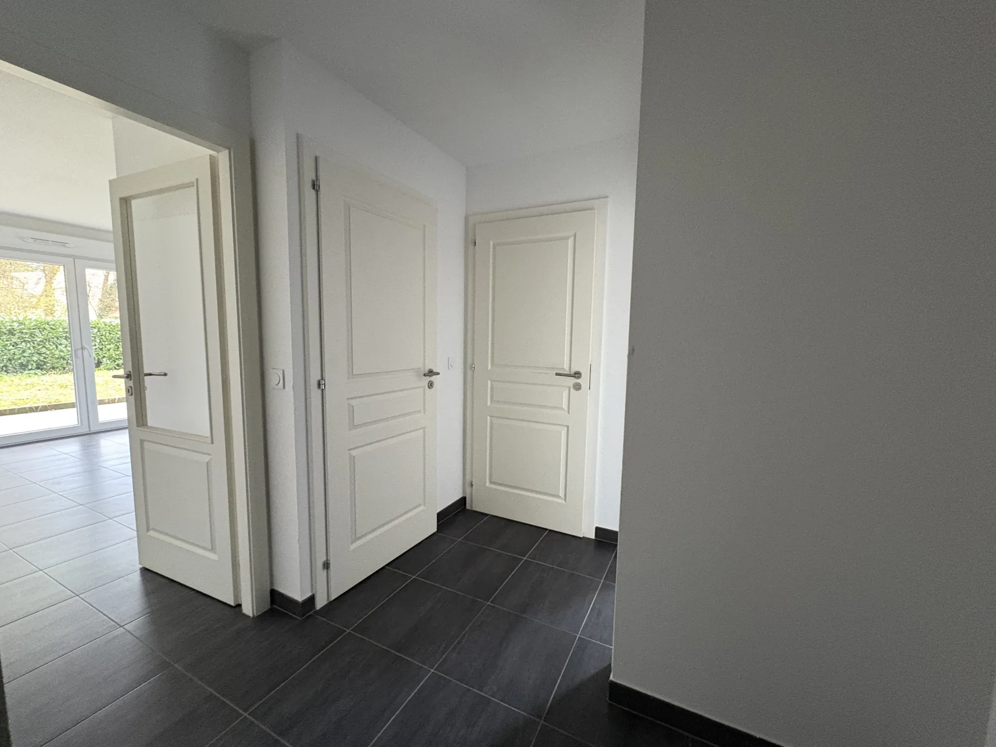 Appartement F2 en rez-de-jardin à Kembs avec jardin et garage 