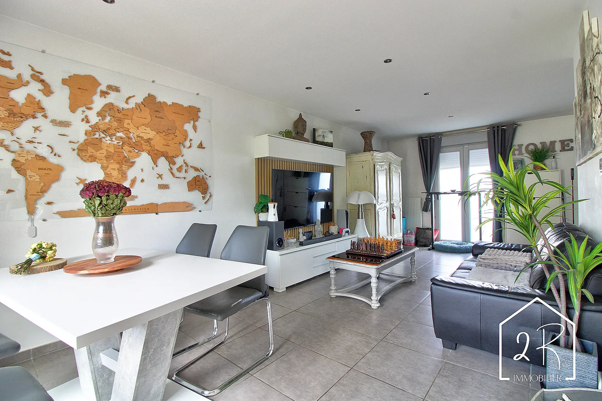 Maison mitoyenne récente de 76 m² à Pont Évêque avec terrasse et parking 