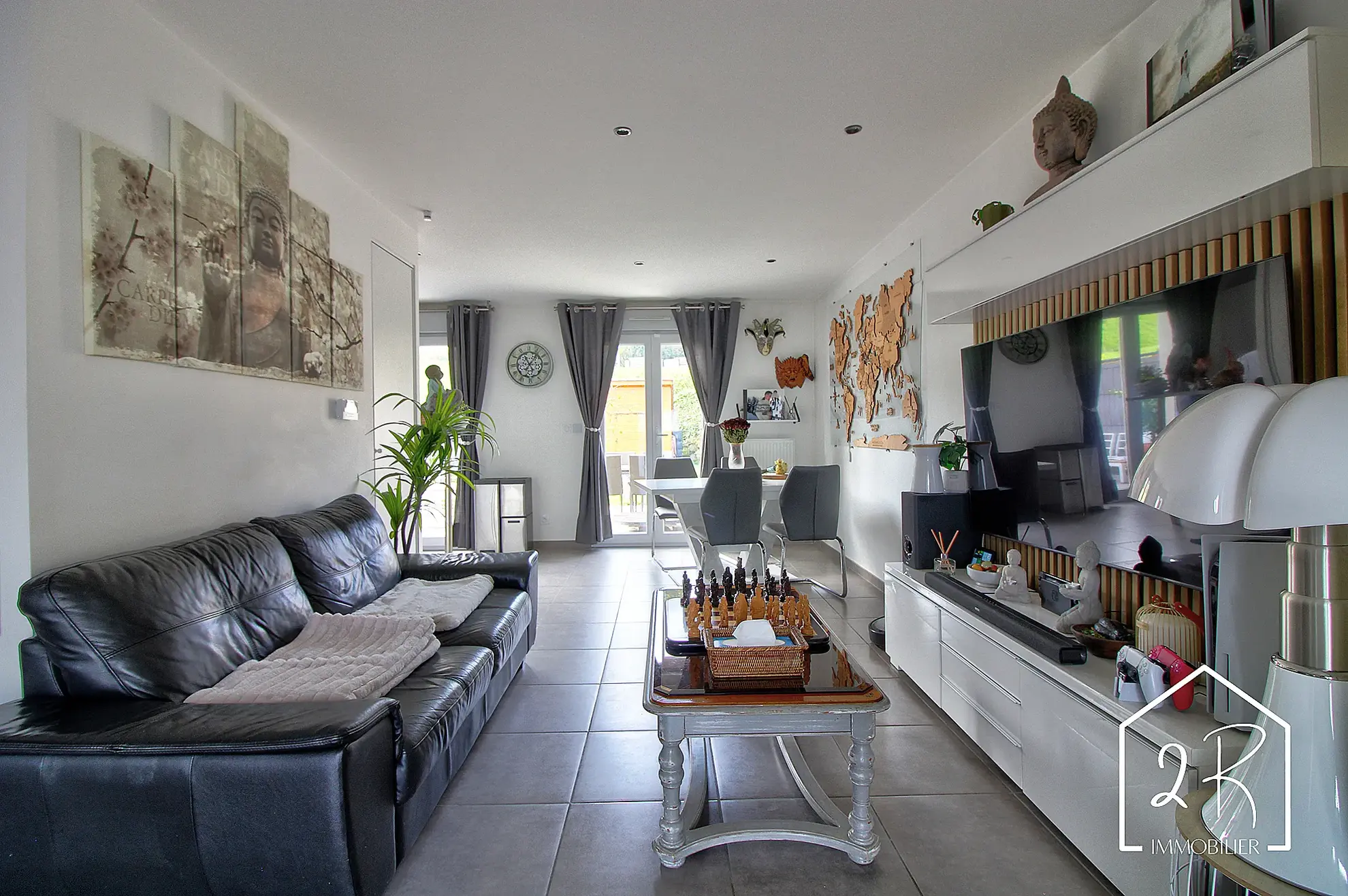 Maison mitoyenne récente de 76 m² à Pont Évêque avec terrasse et parking 