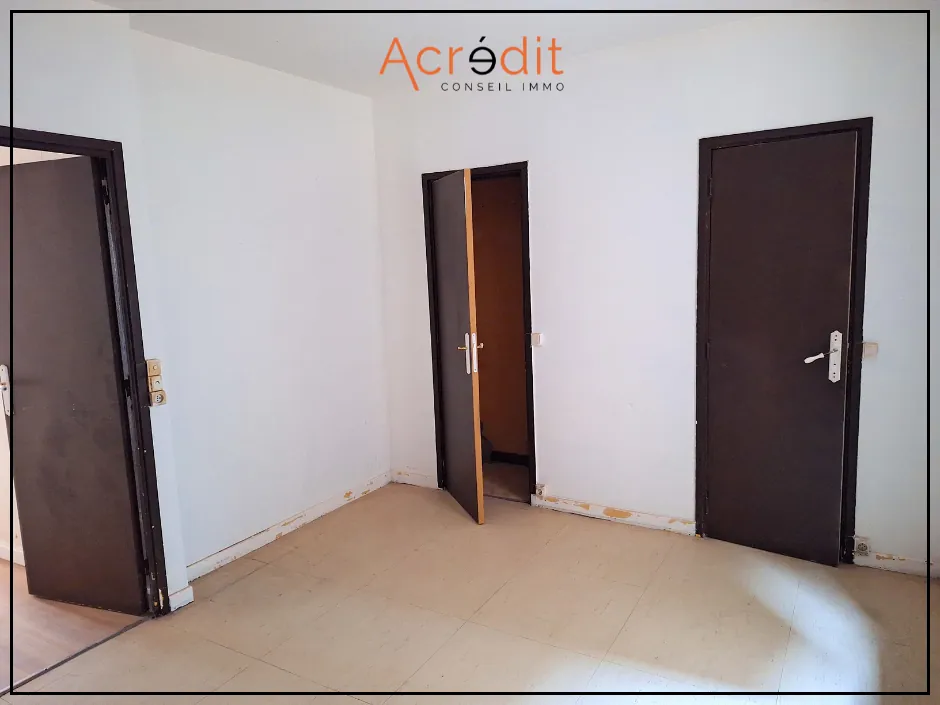 Immeuble de rapport à Béziers avec 4 appartements, idéal pour investissement locatif 