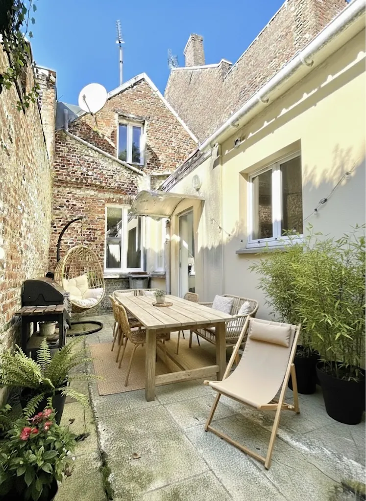 Maison 2 chambres à Saint-Quentin, quartier Saint-Jean avec terrasse et cave 